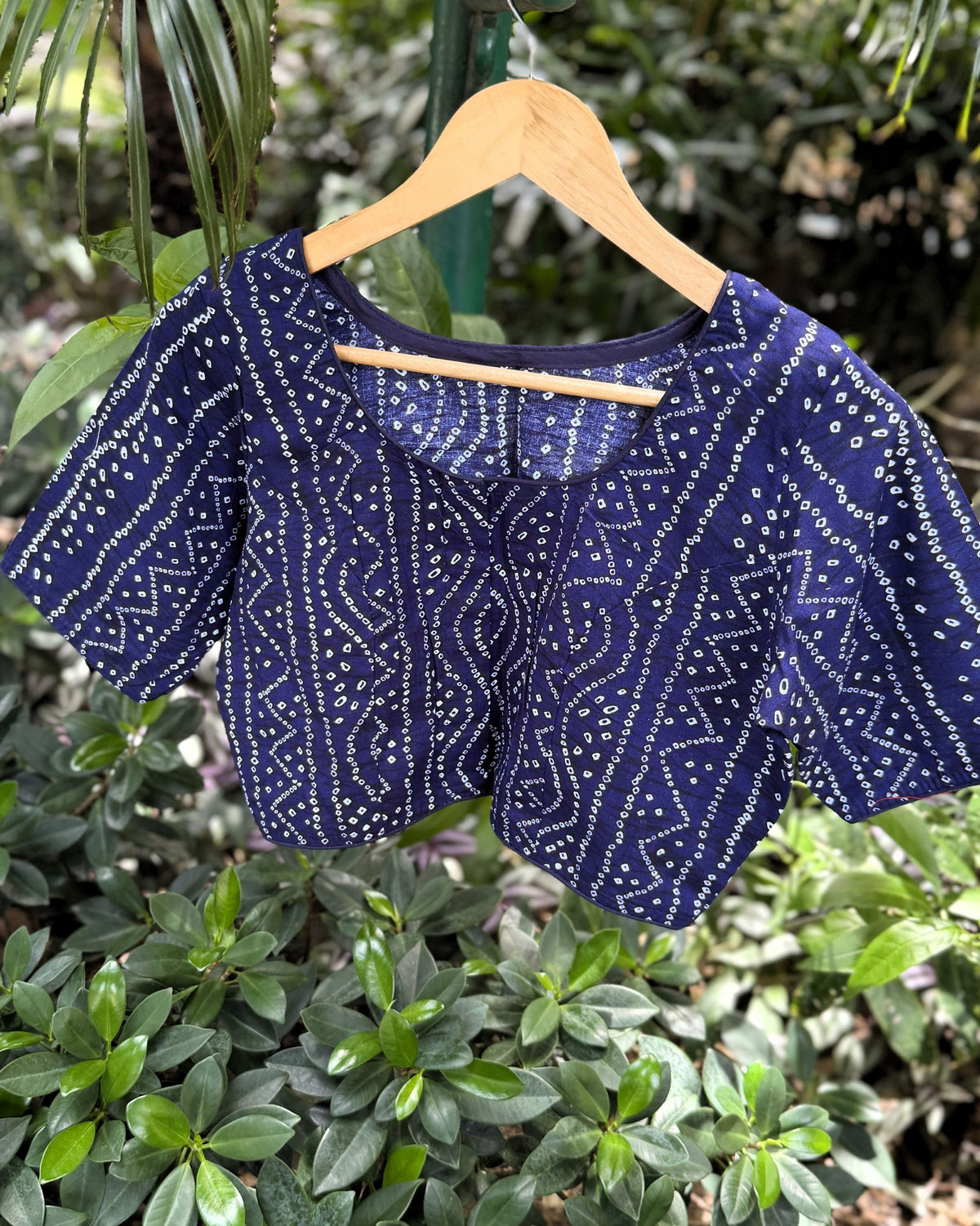 blue cotton bandhej blouse with short sleeves and white dotted pattern
