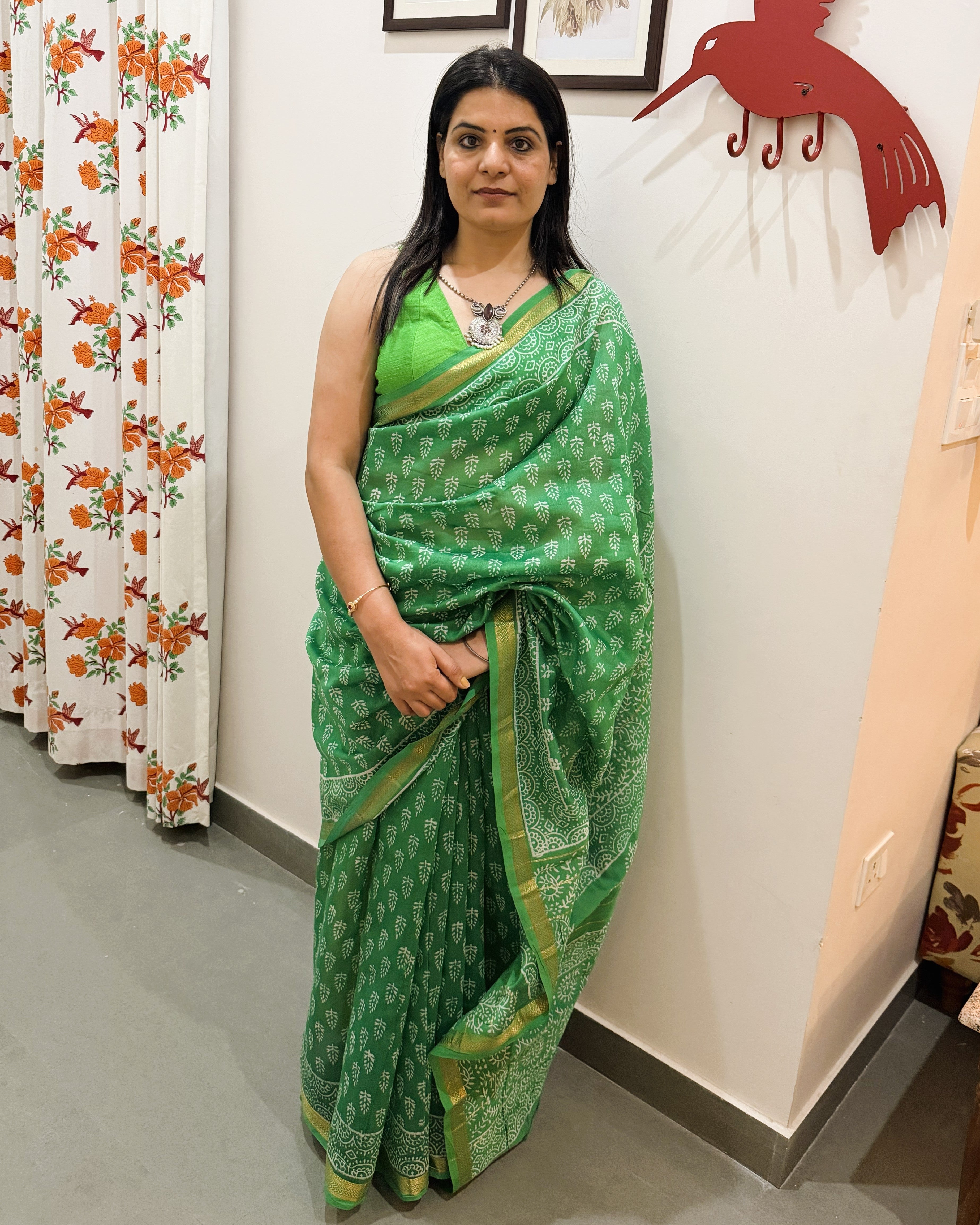 Green leaf print Maheshwari silk saree full view with elegant silk border