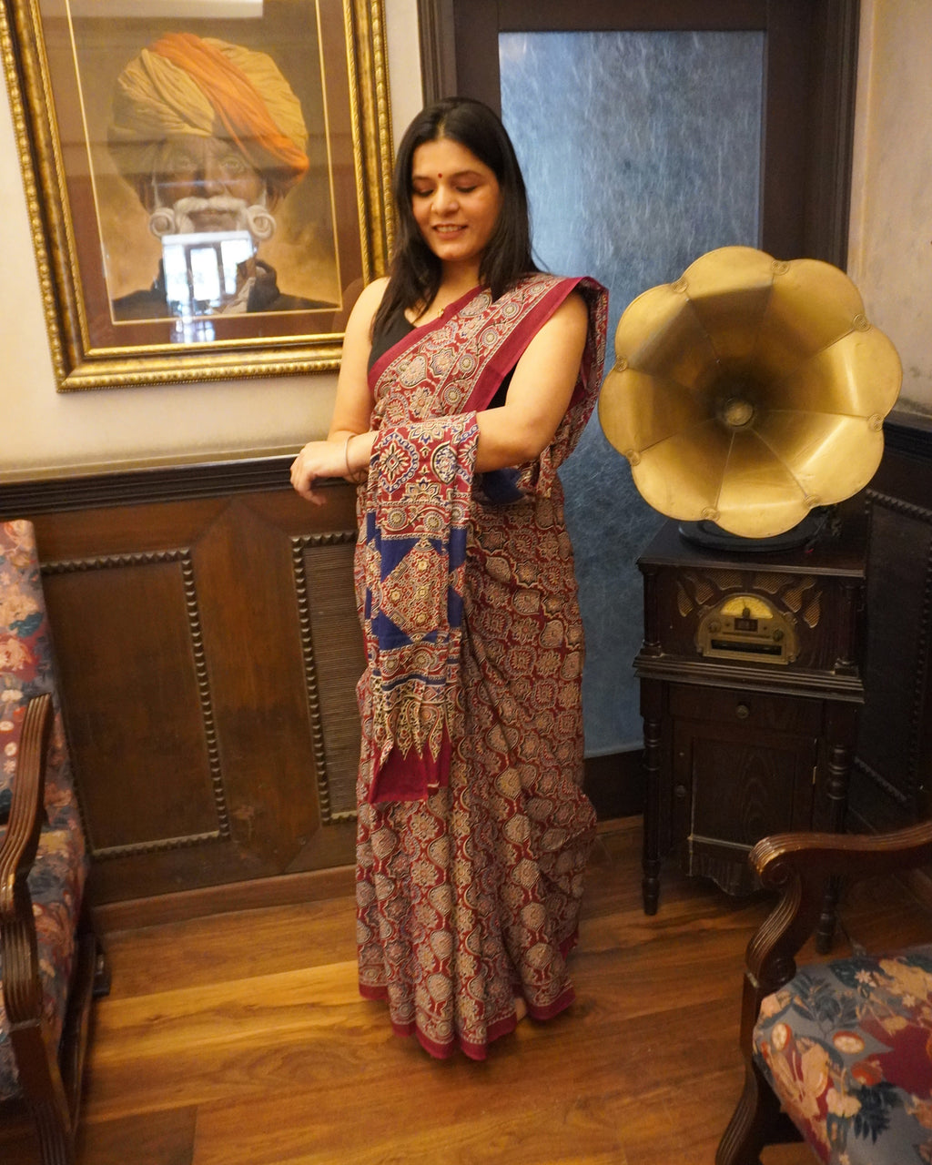Front Look of maroon and blue Ajrakh print mul cotton saree highlighting overall look and flow