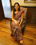 Front view of maroon and blue Ajrakh print mul cotton saree showcasing full drape and traditional patterns