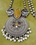 Antique brass peacock motif necklace set with amber stone, multicolour floral pendant and pearl drops full view