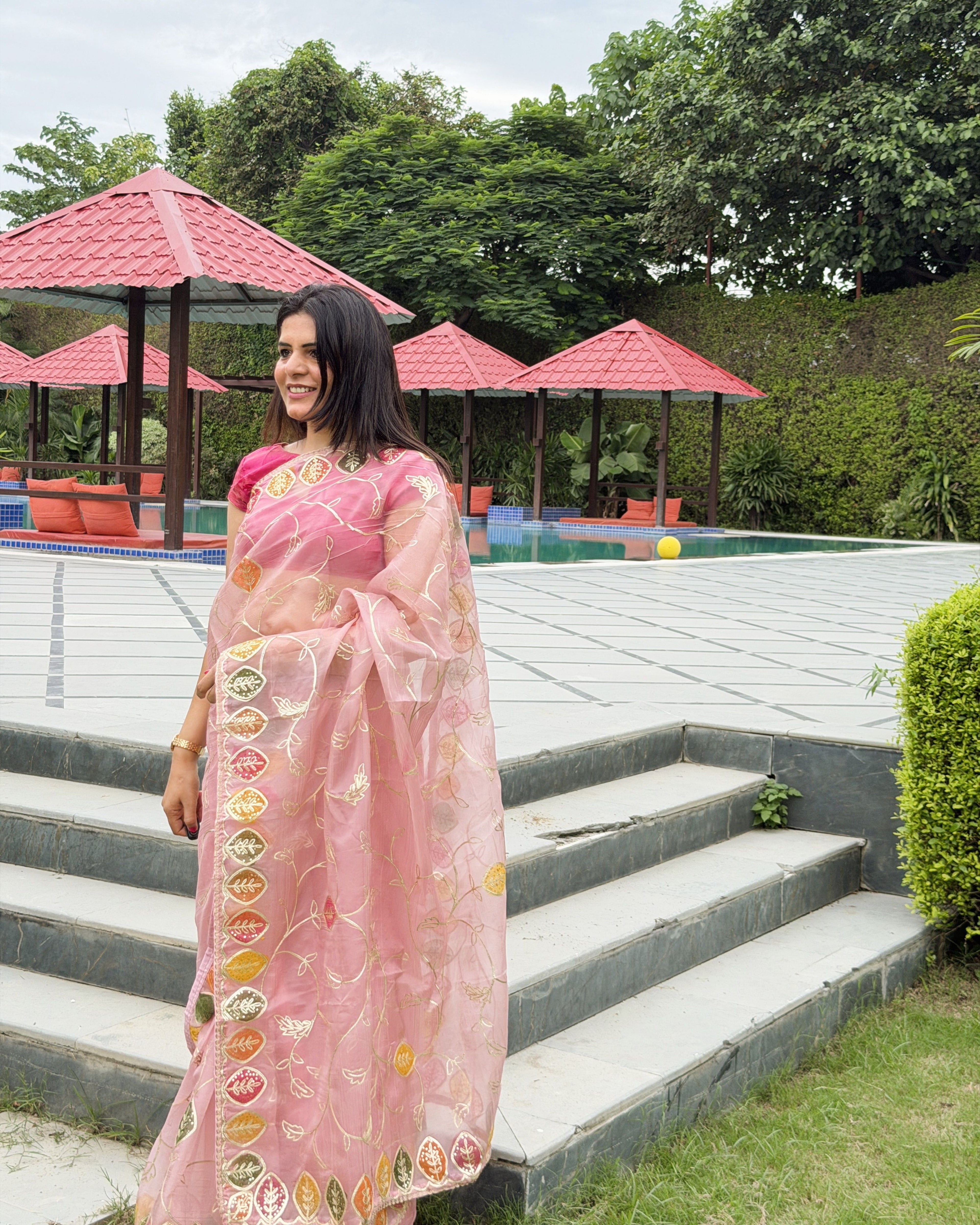 peach organza saree with multicolour gotta patti motifs and intricate embellishment
