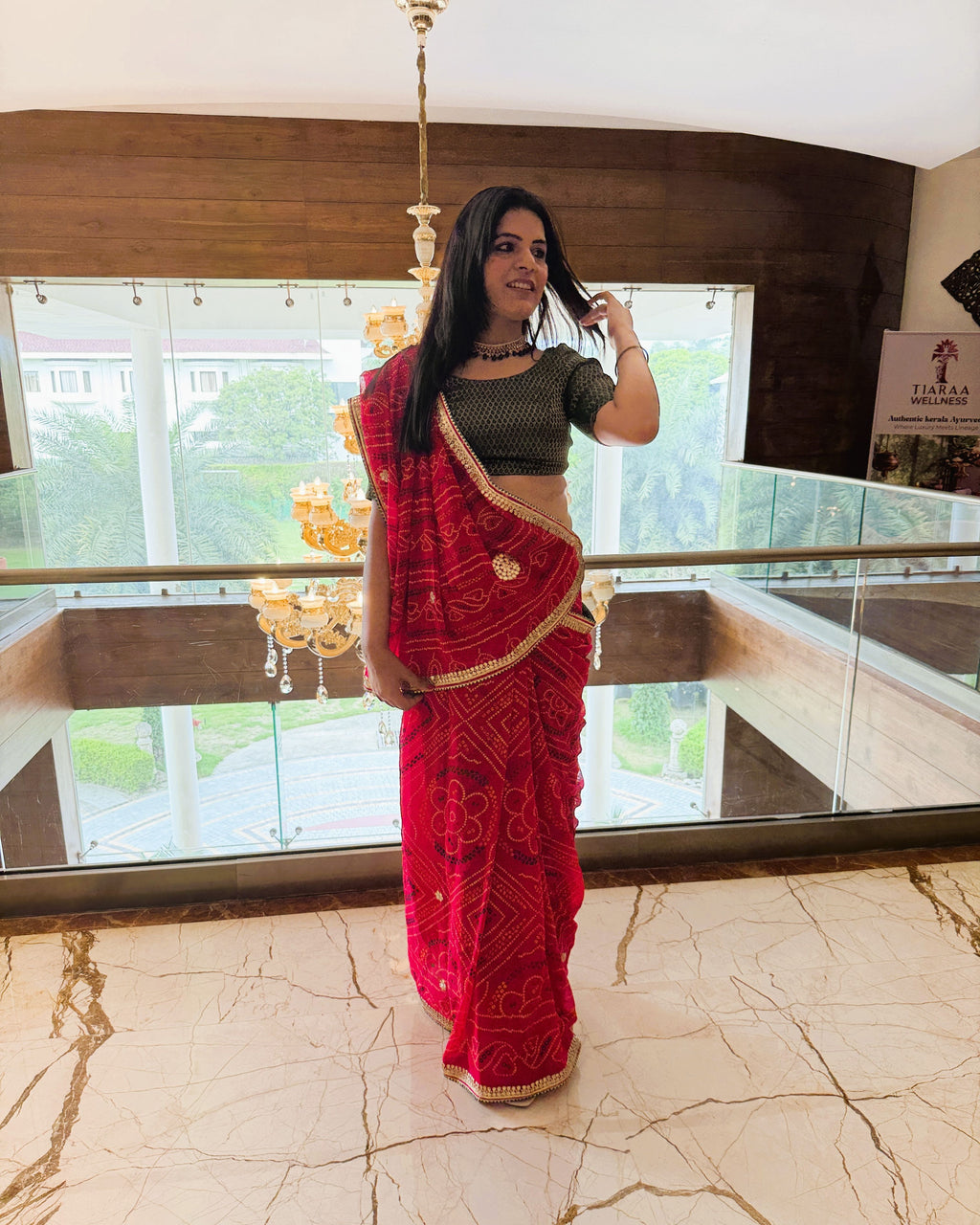 rani pink pure georgette bandhej saree with gotta patti border front view