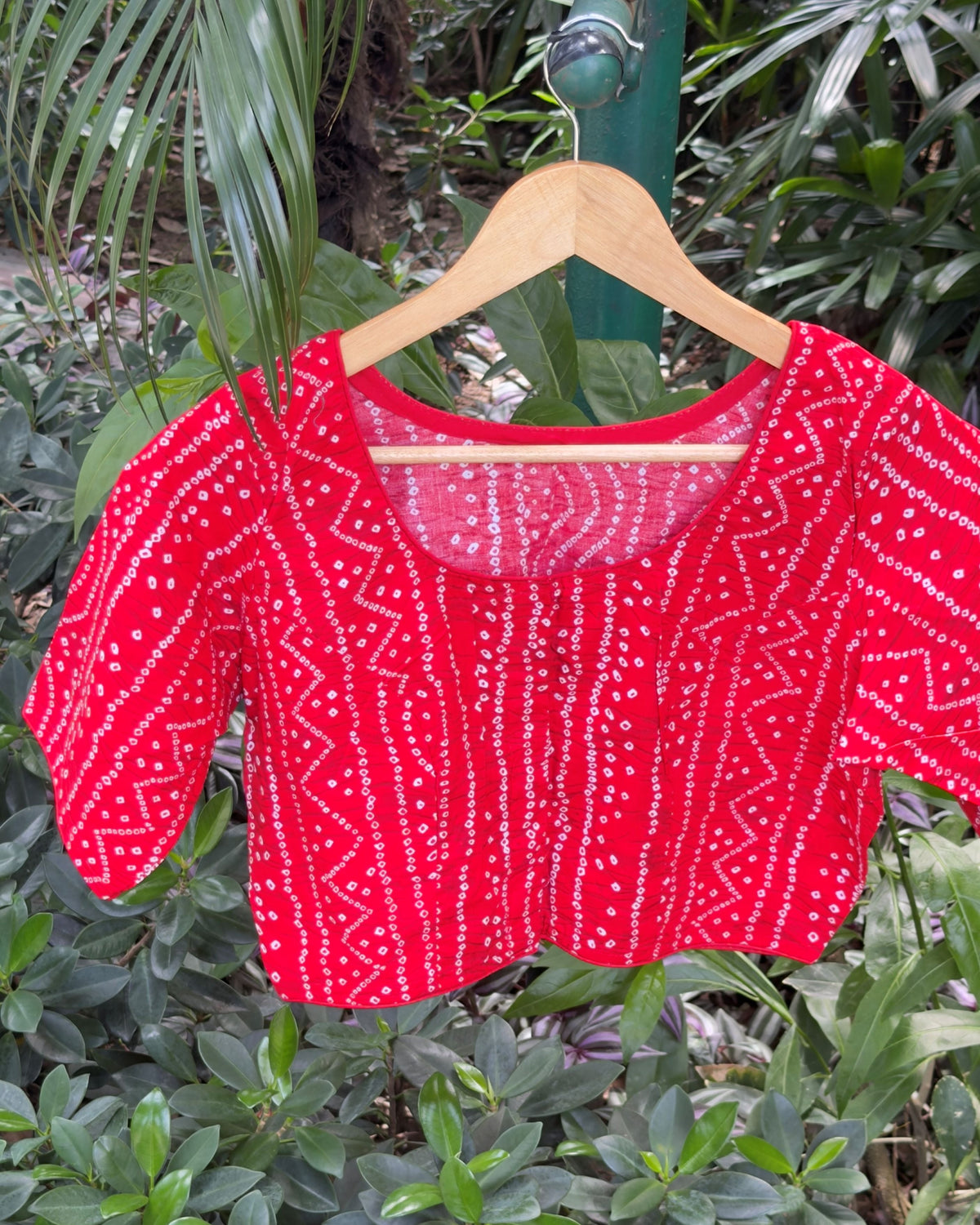 red cotton blouse with traditional white bandhej dotted pattern