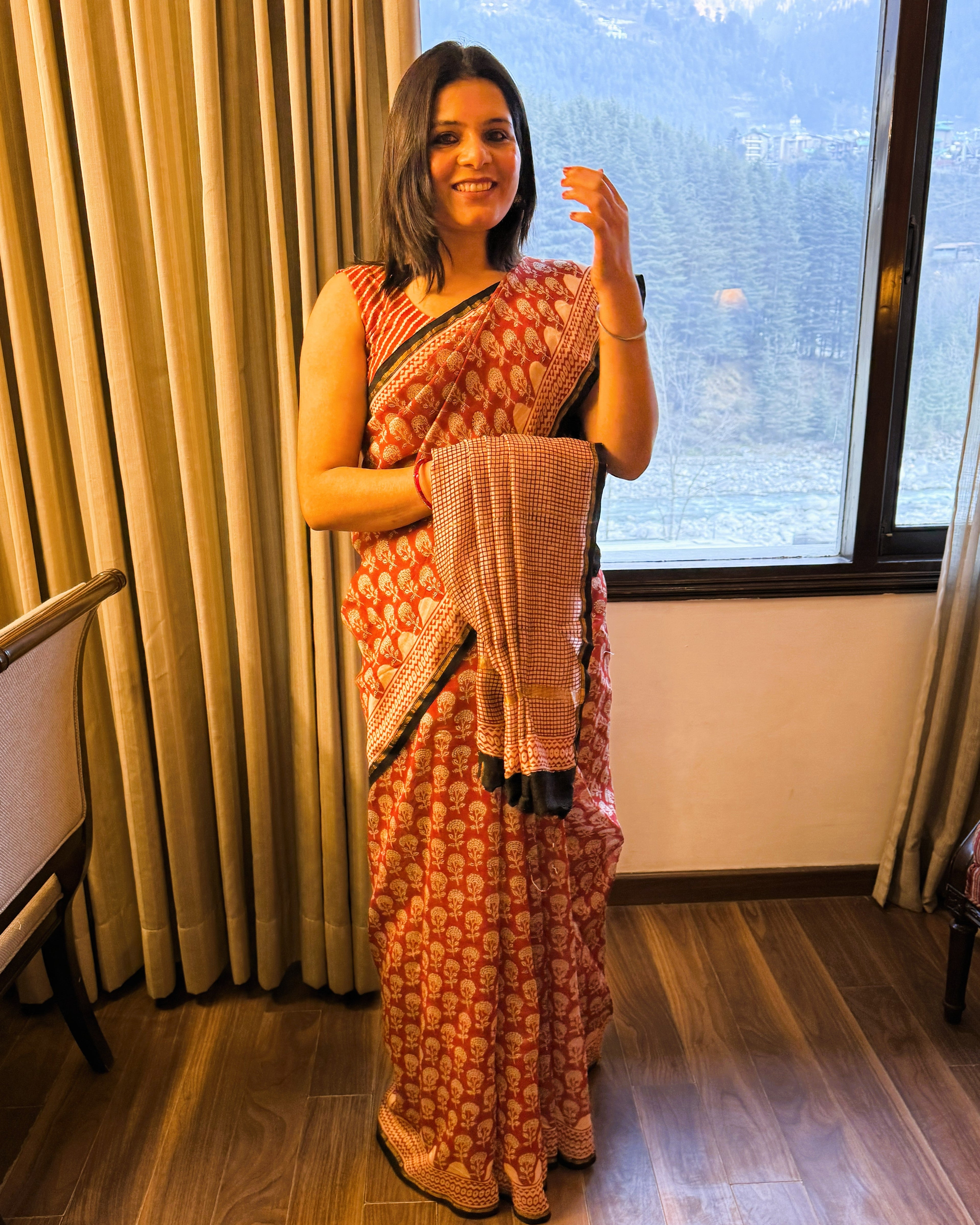 Front view of rustic maroon Chanderi silk handblock Bagru print saree showcasing rich color and elegant drape