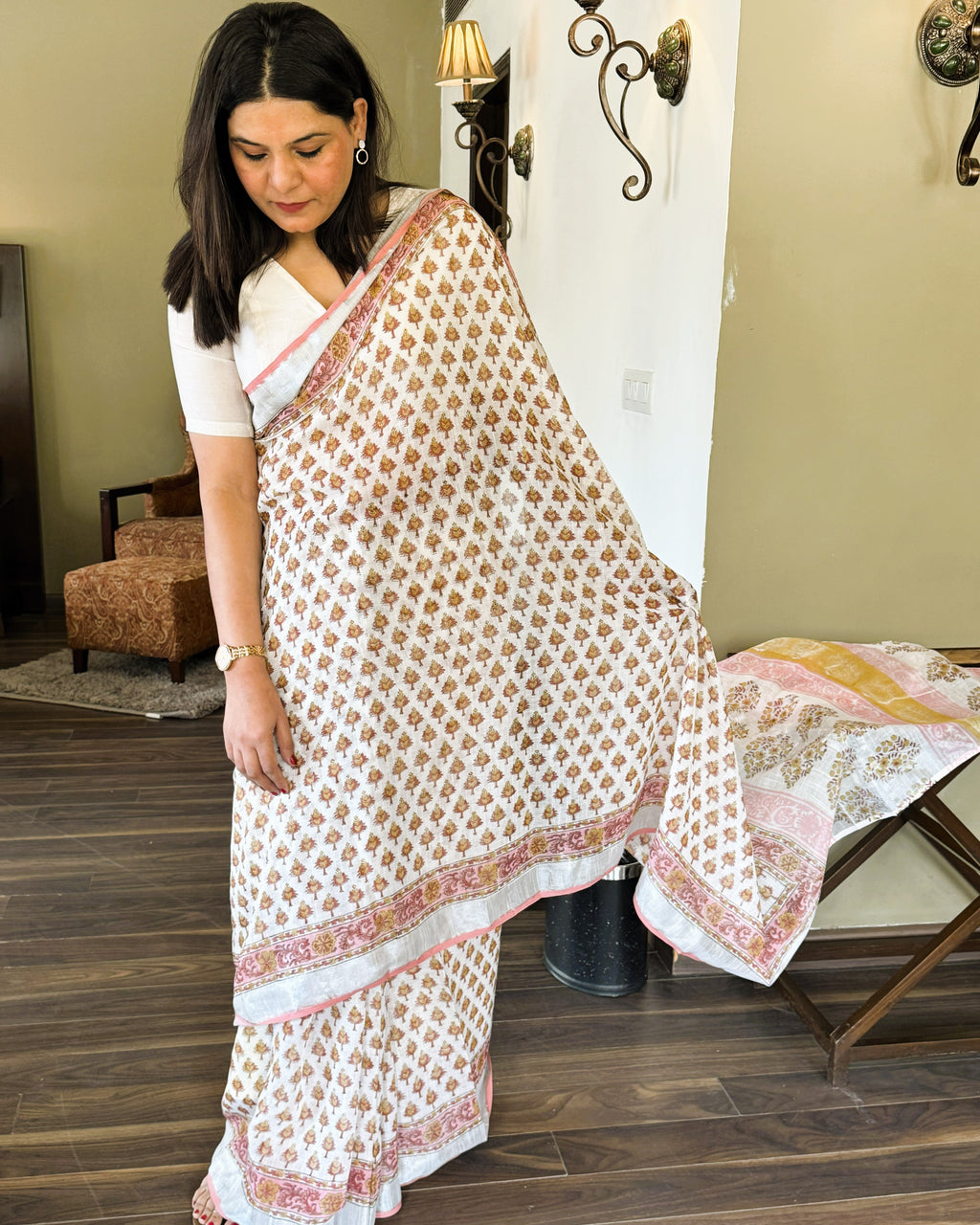 Alternate front view of white multicolour handblock leaf motif print pure linen saree highlighting overall look and flow