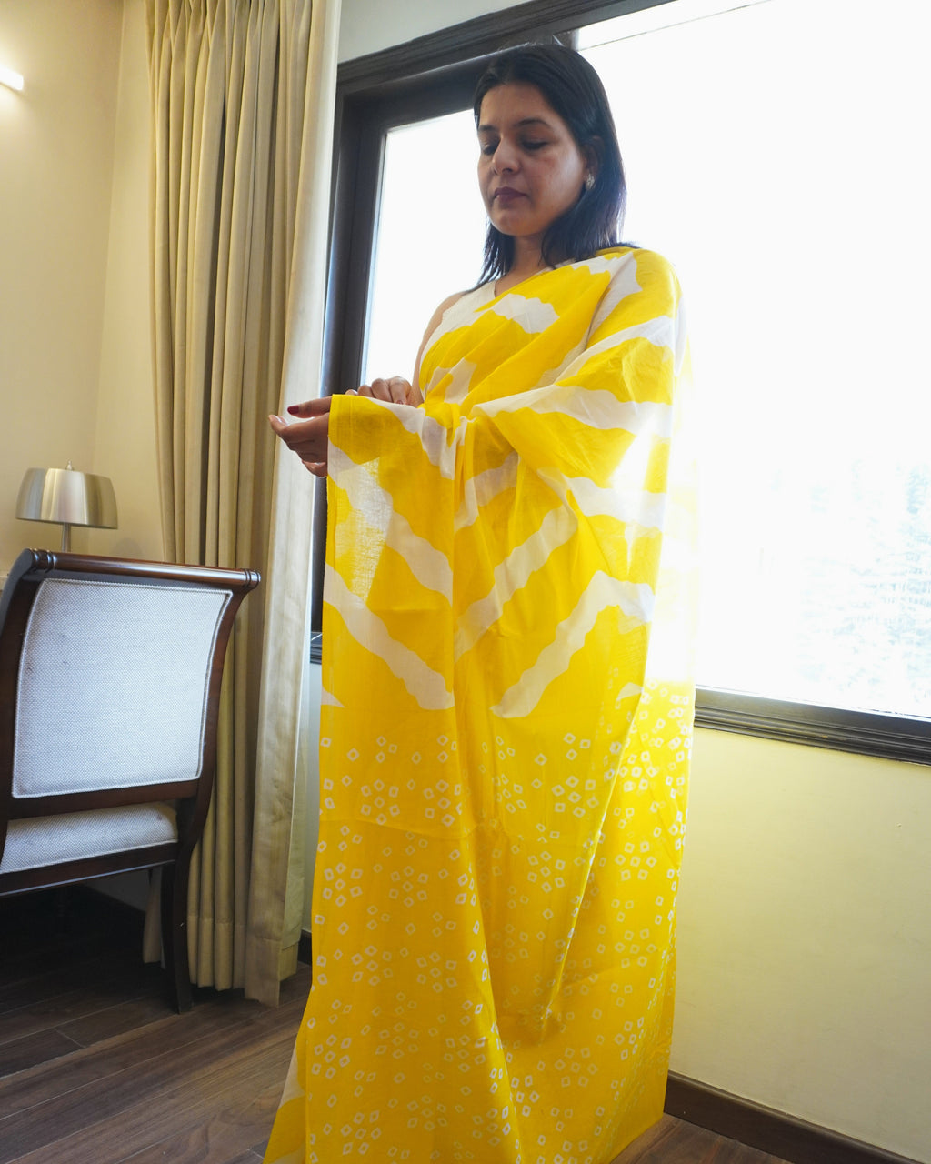 Pallu detail of yellow and white Leheriya cotton saree highlighting classic Leheriya design and craftsmanship