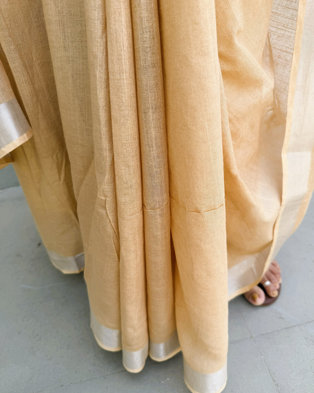 fabric texture detail beige pure linen saree