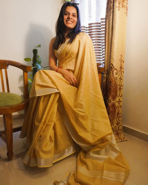 beige pure linen saree front view with zari border