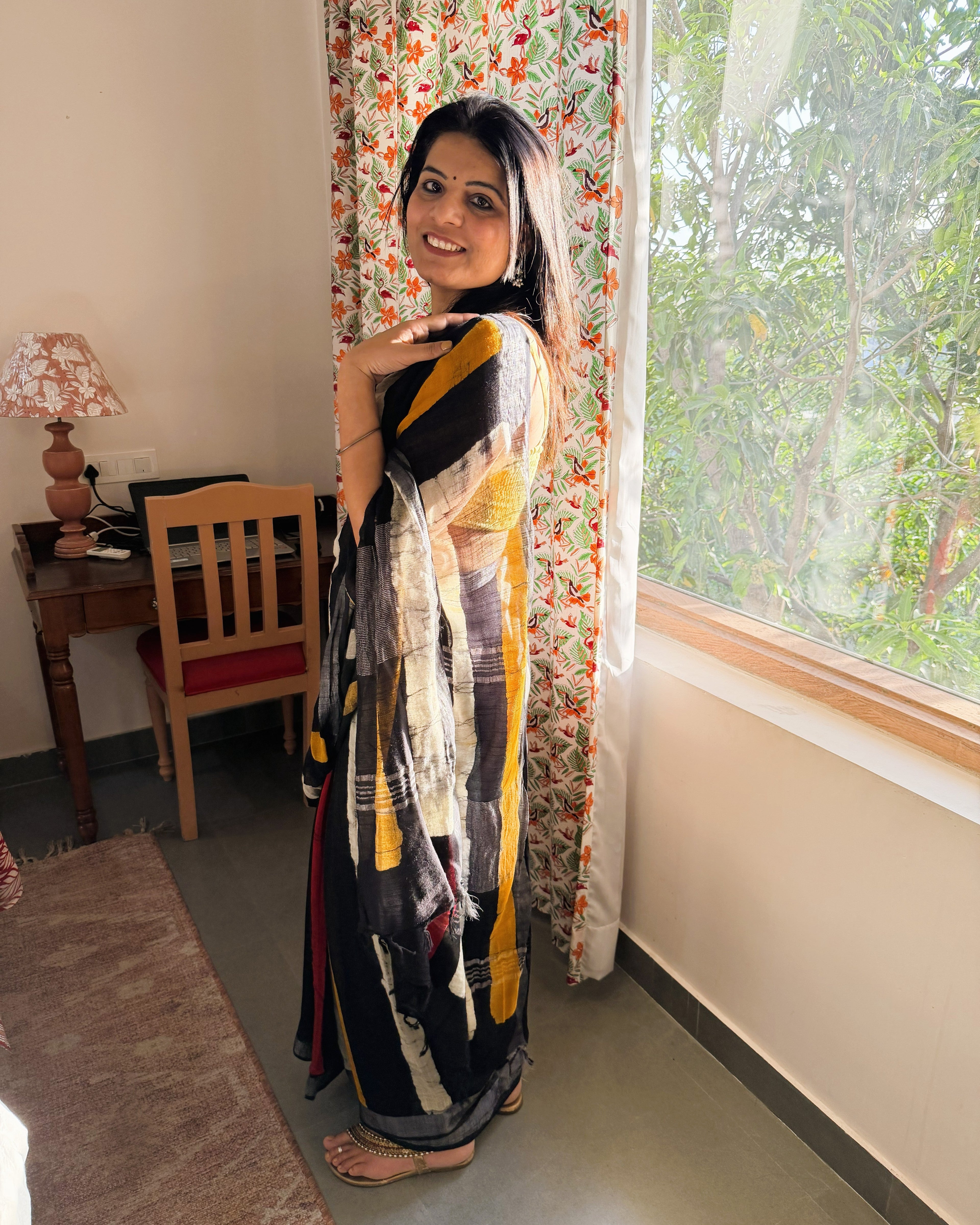 side view black batik linen saree drape