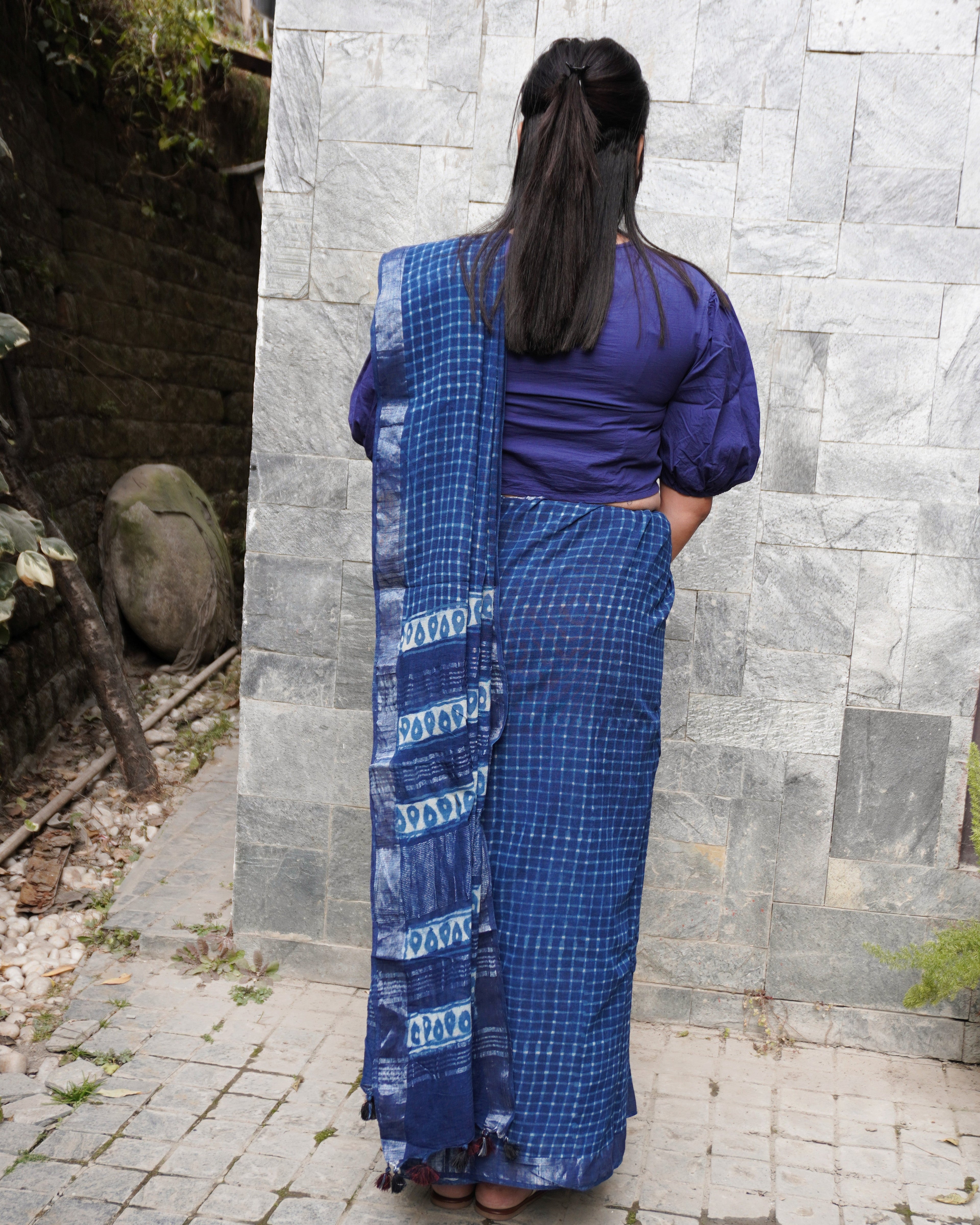 Back view of blue linen check saree