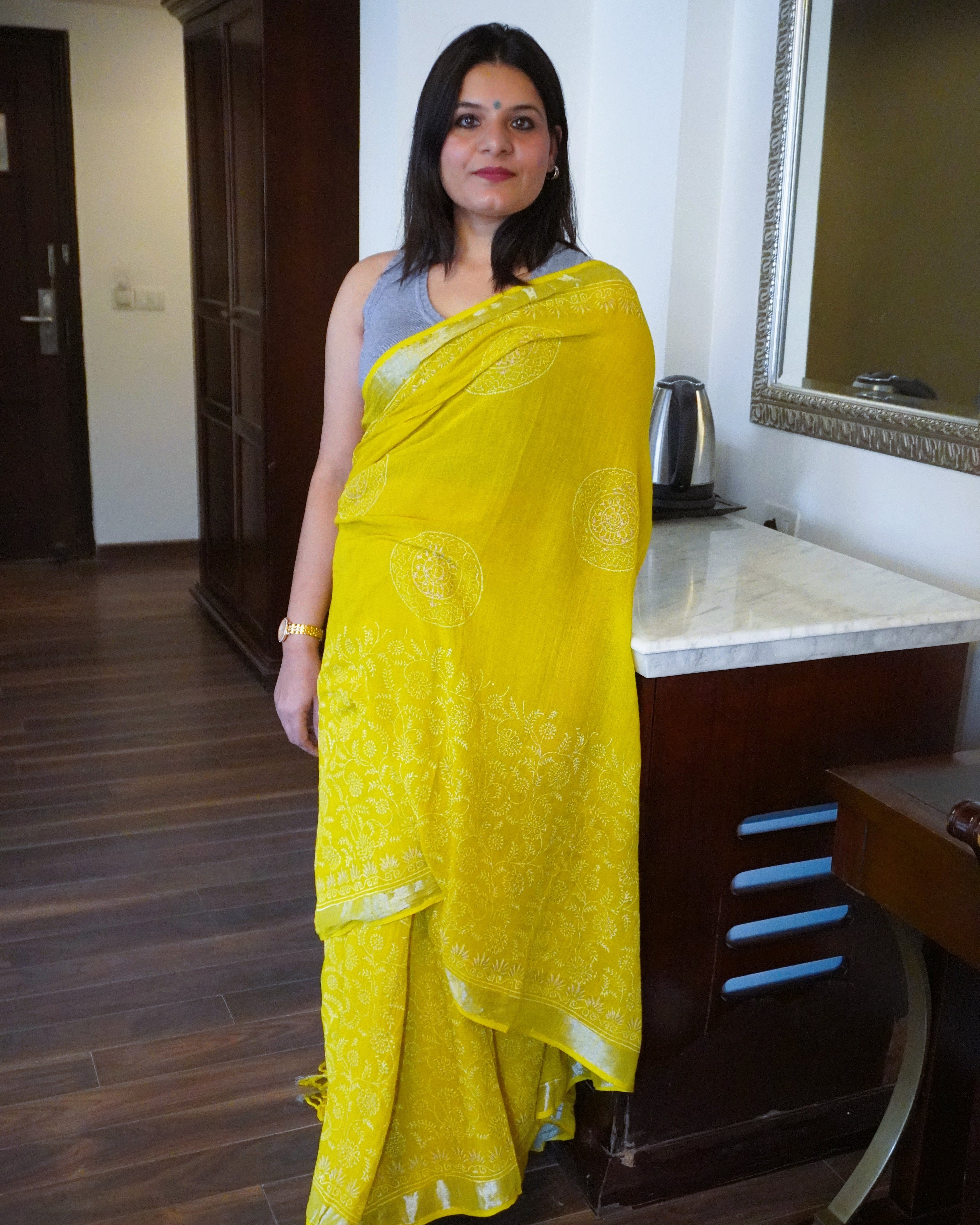 Front view of green pure linen saree with golden print