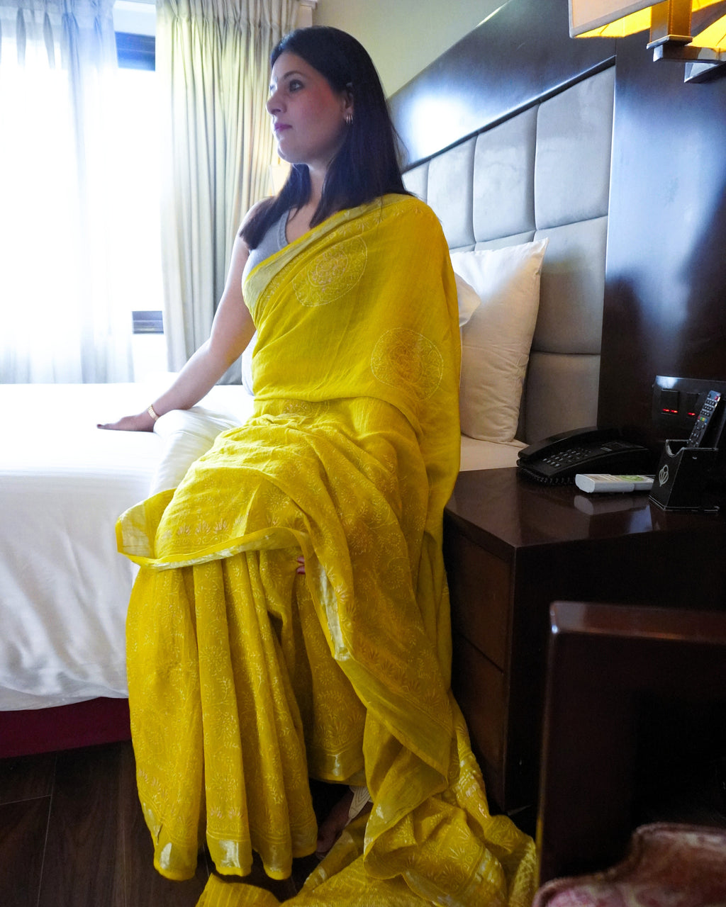 Side view of green pure linen saree with elegant golden print