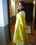 Side view of green cotton saree with white polka dots