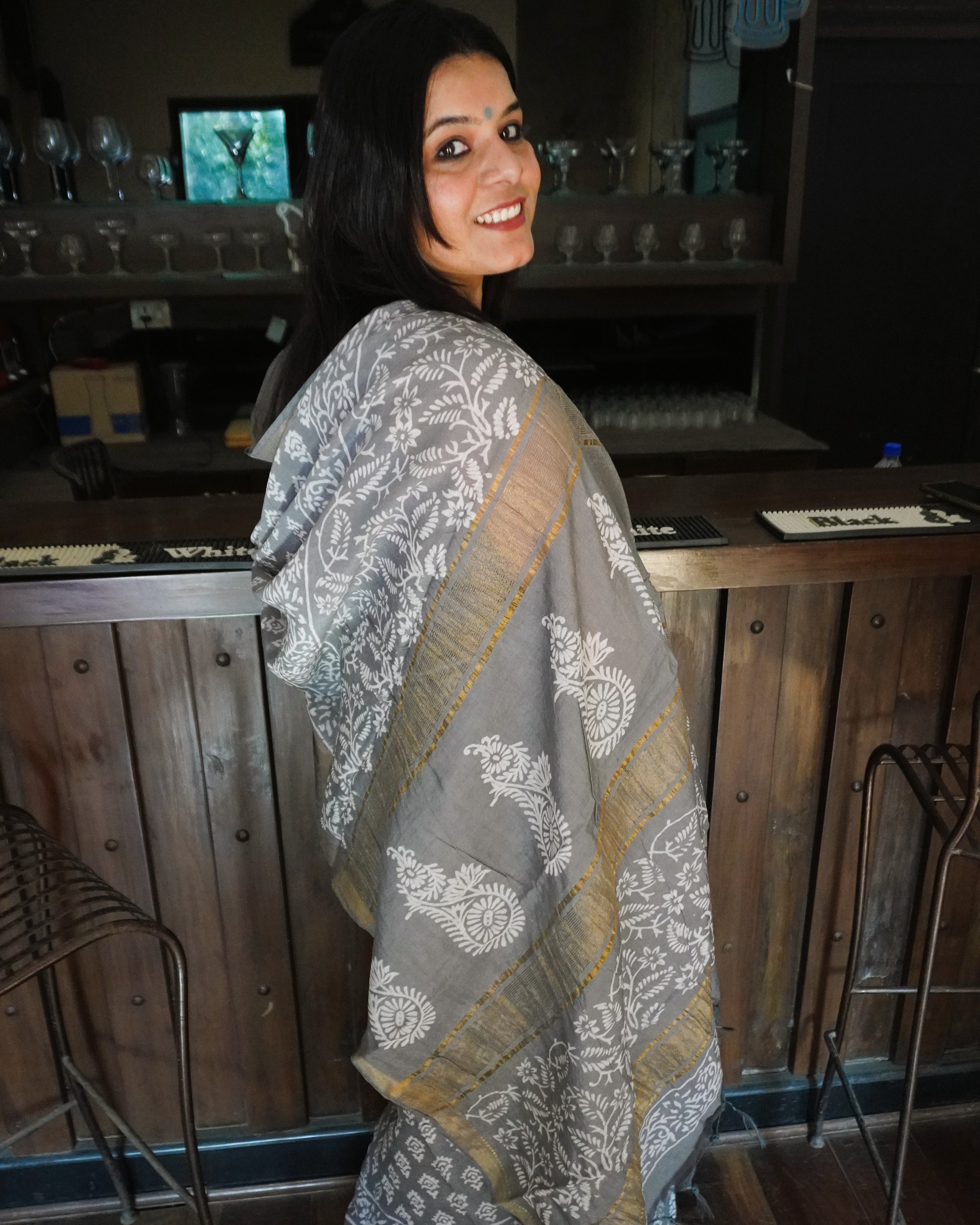 Side view of grey handblock print pure linen saree