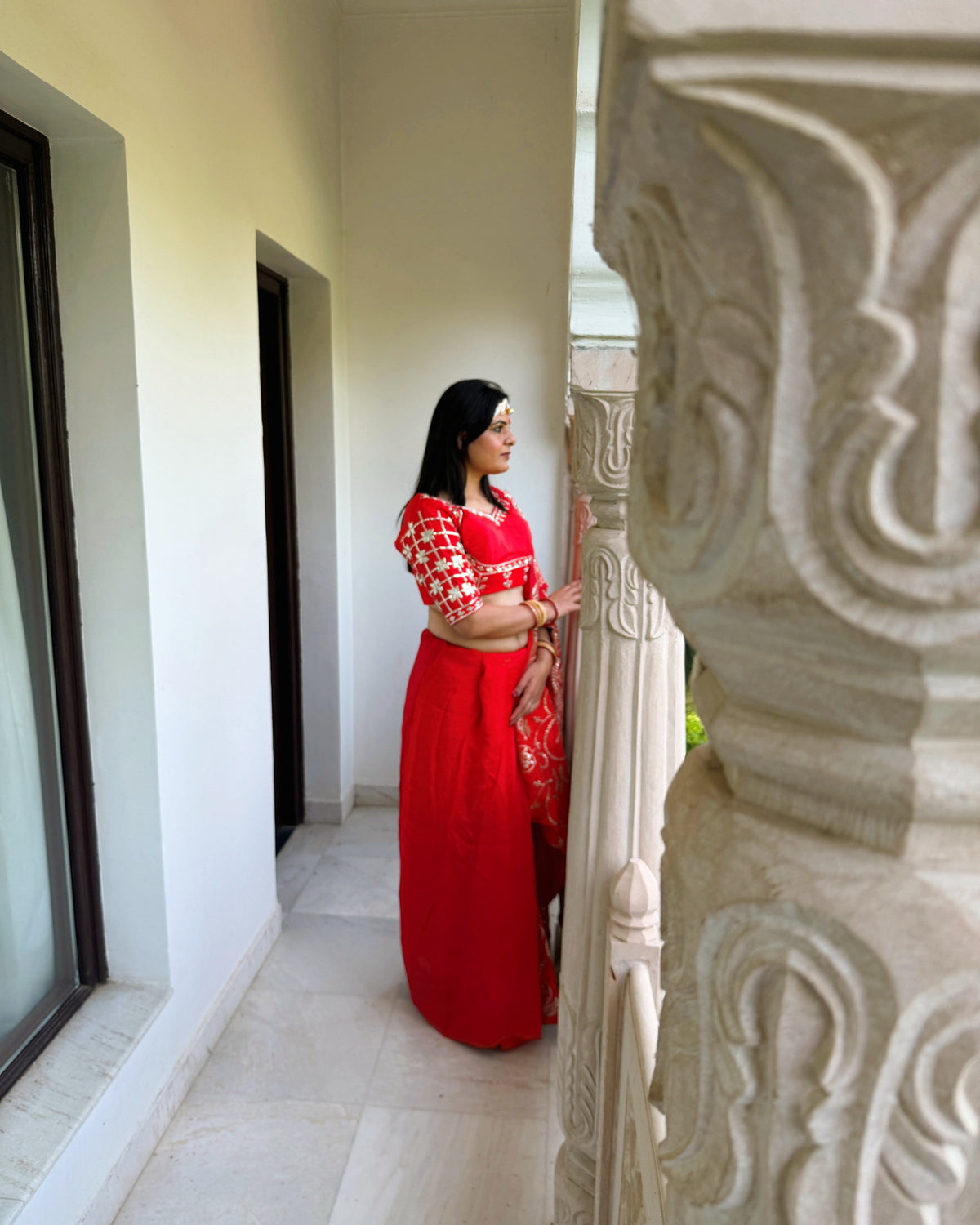 Detailed Gotta Patti embroidery on red HO Silk saree