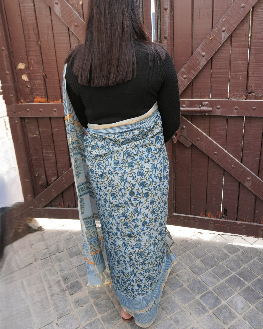 Back view of light blue Sanganeri print cotton Chanderi saree