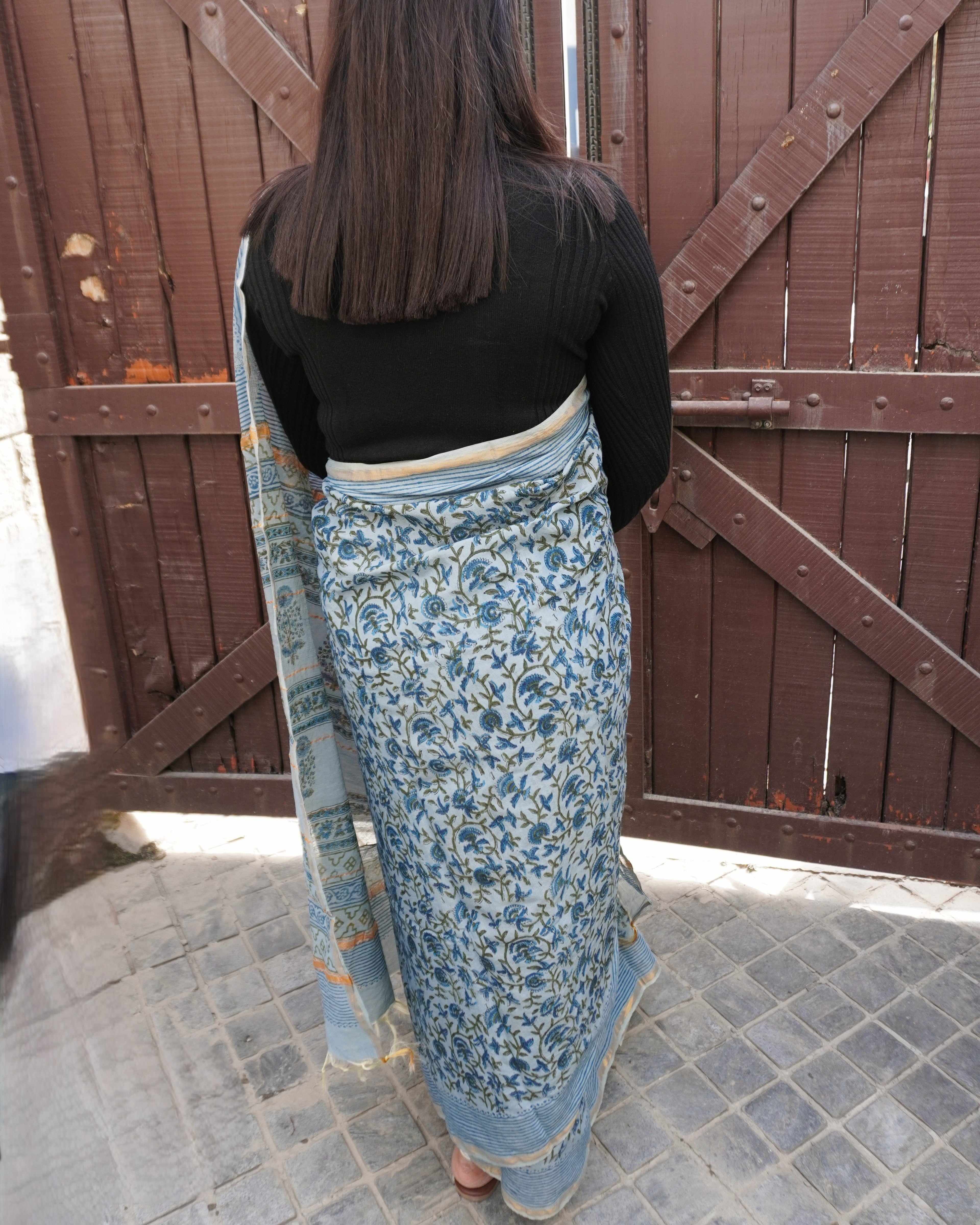 Back view of light blue Sanganeri print cotton Chanderi saree