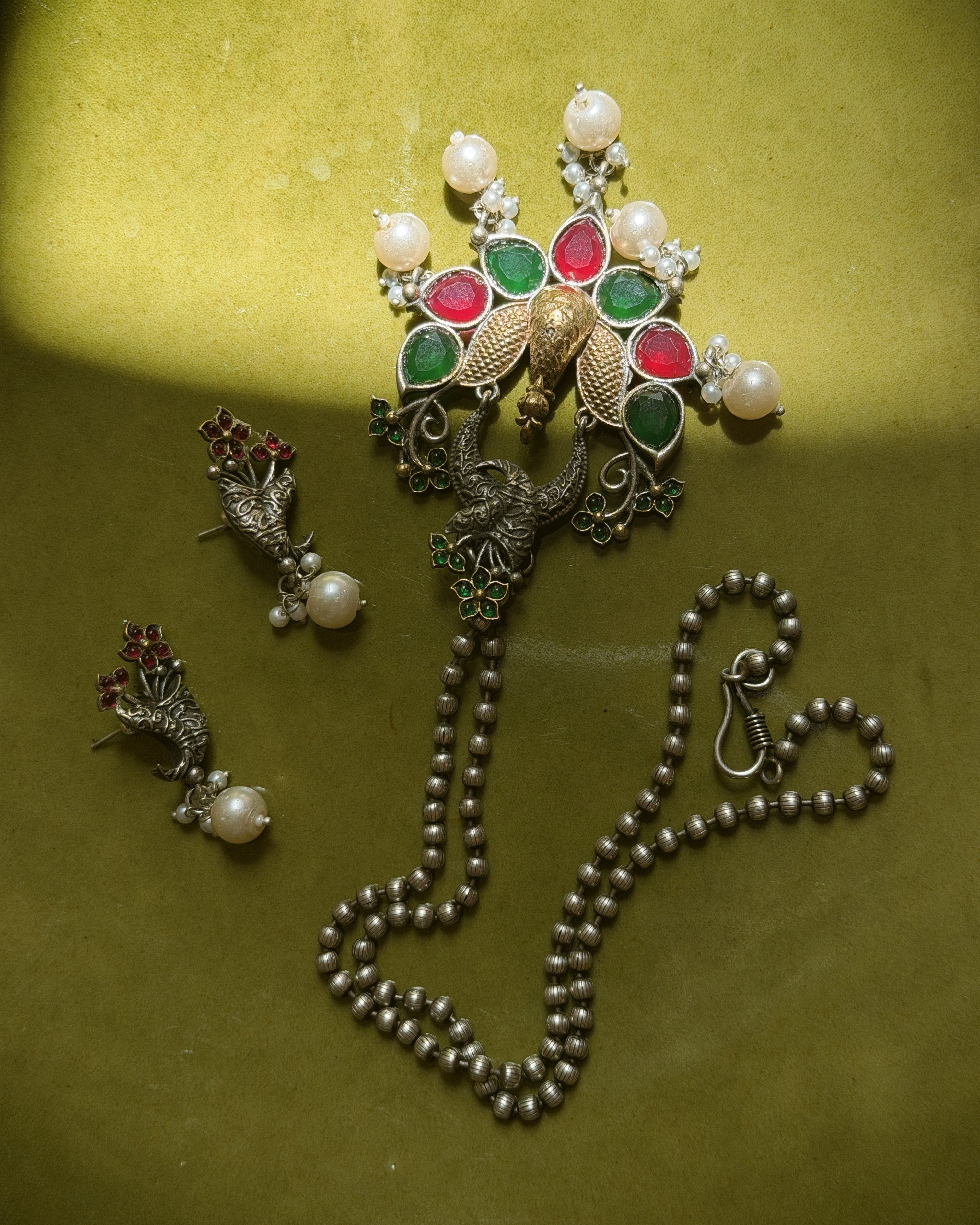 Festive traditional jewellery set with peacock design and pearls