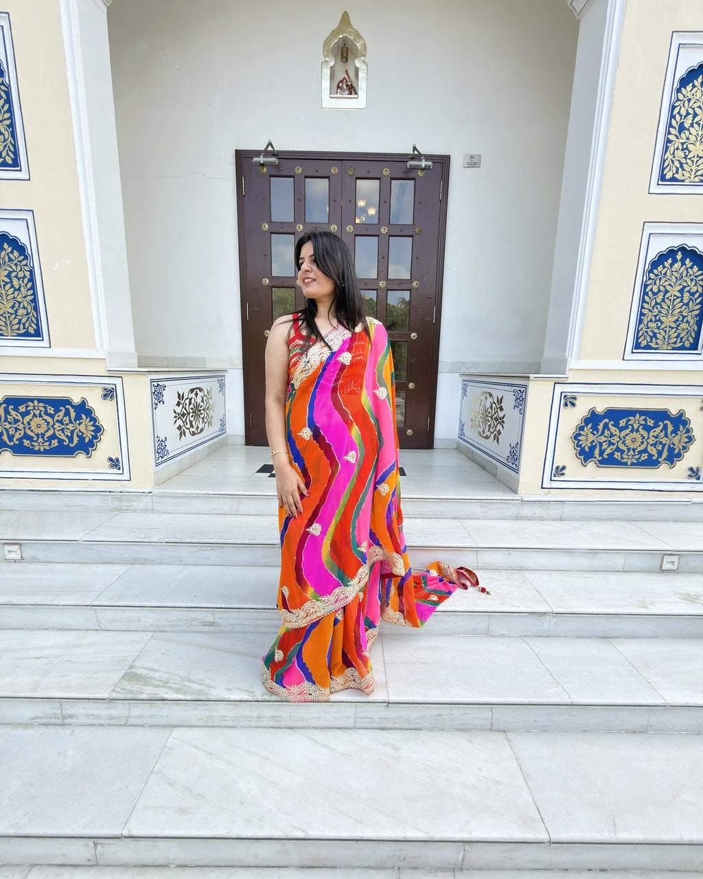 Multicolor Rajasthani Lehariya georgette saree with traditional embellishment
