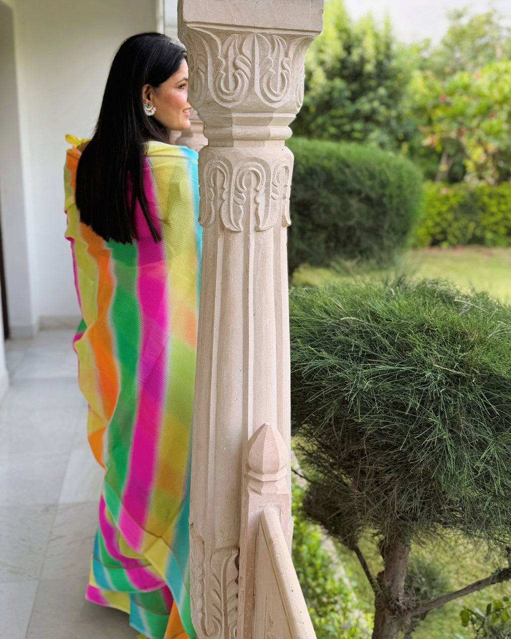 Multicolor lehriya semi kota doria saree in green, pink, yellow, and blue, full back view