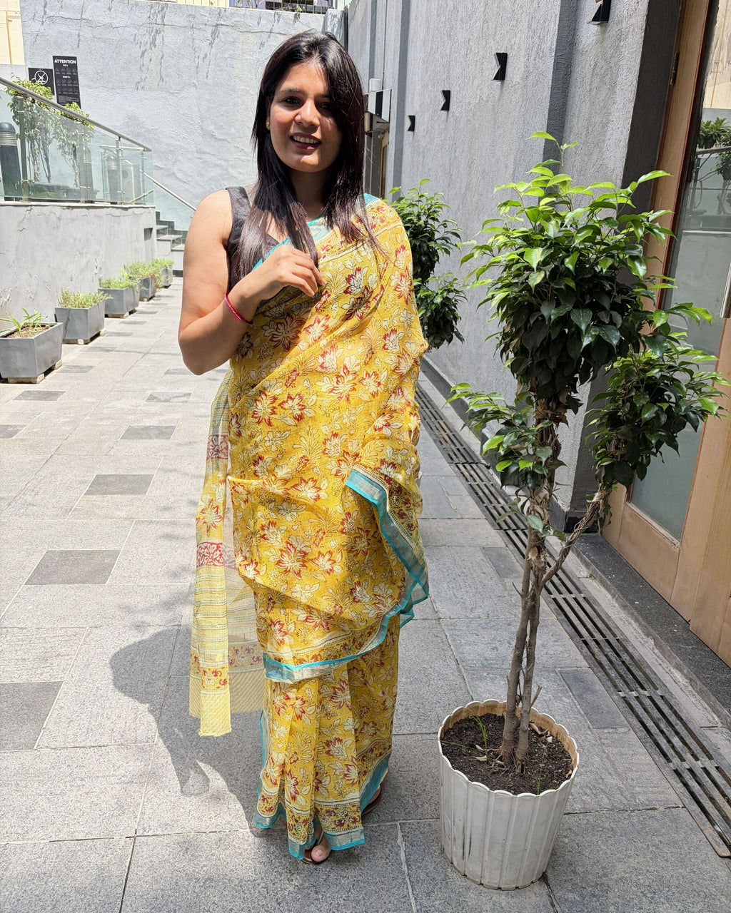 Detailed view of floral and botanical motifs on Kota Doria saree