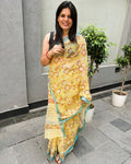 Mustard yellow Kota Doria saree with multicolour floral print