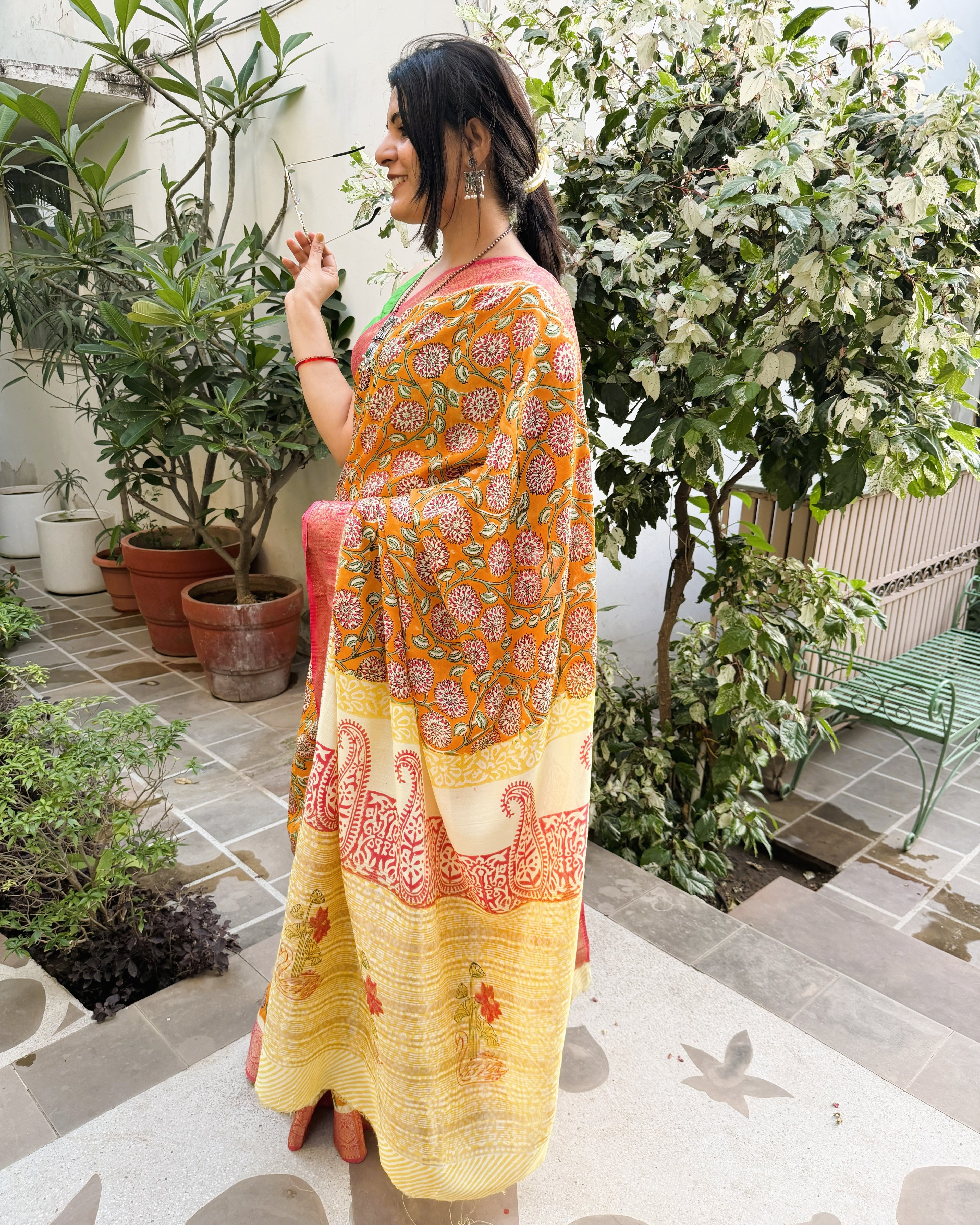 side view orange modal silk saree sanganeri print drape
