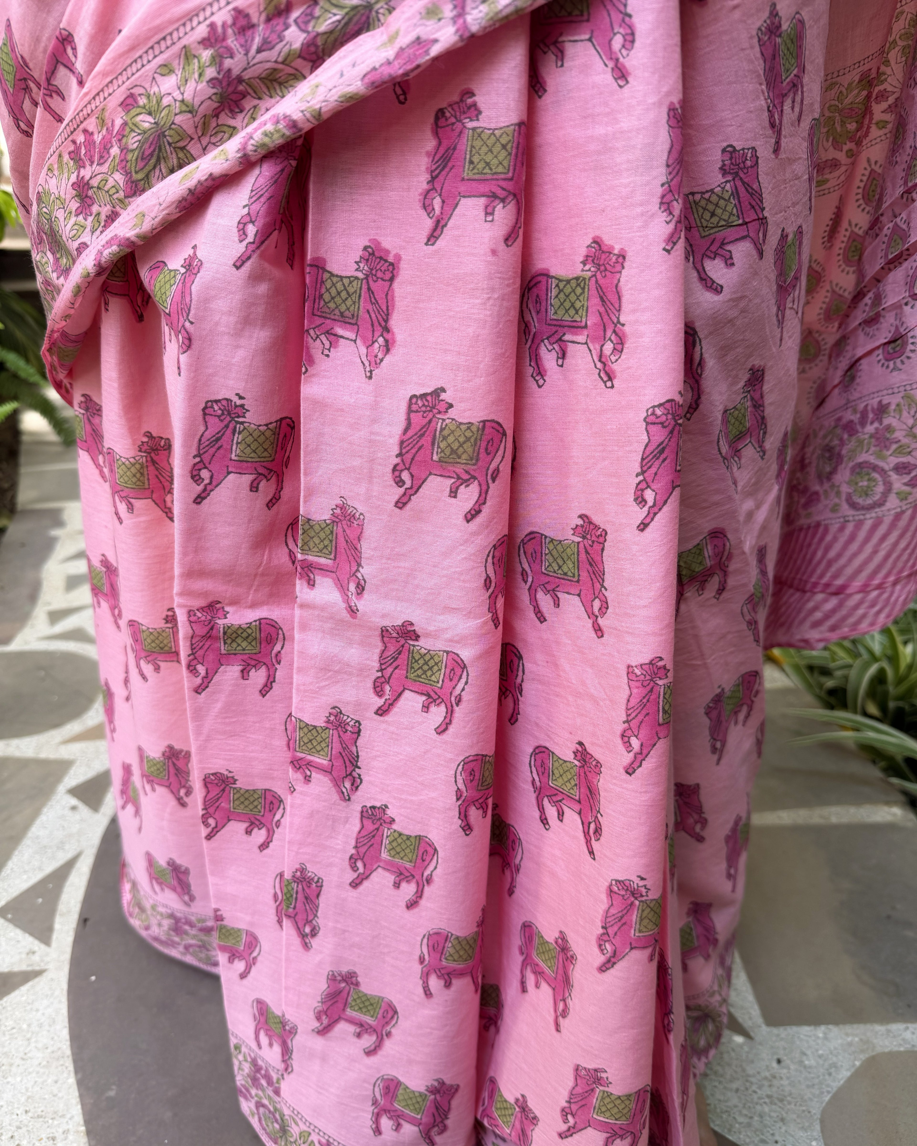 close up cow print design pink mul cotton saree
