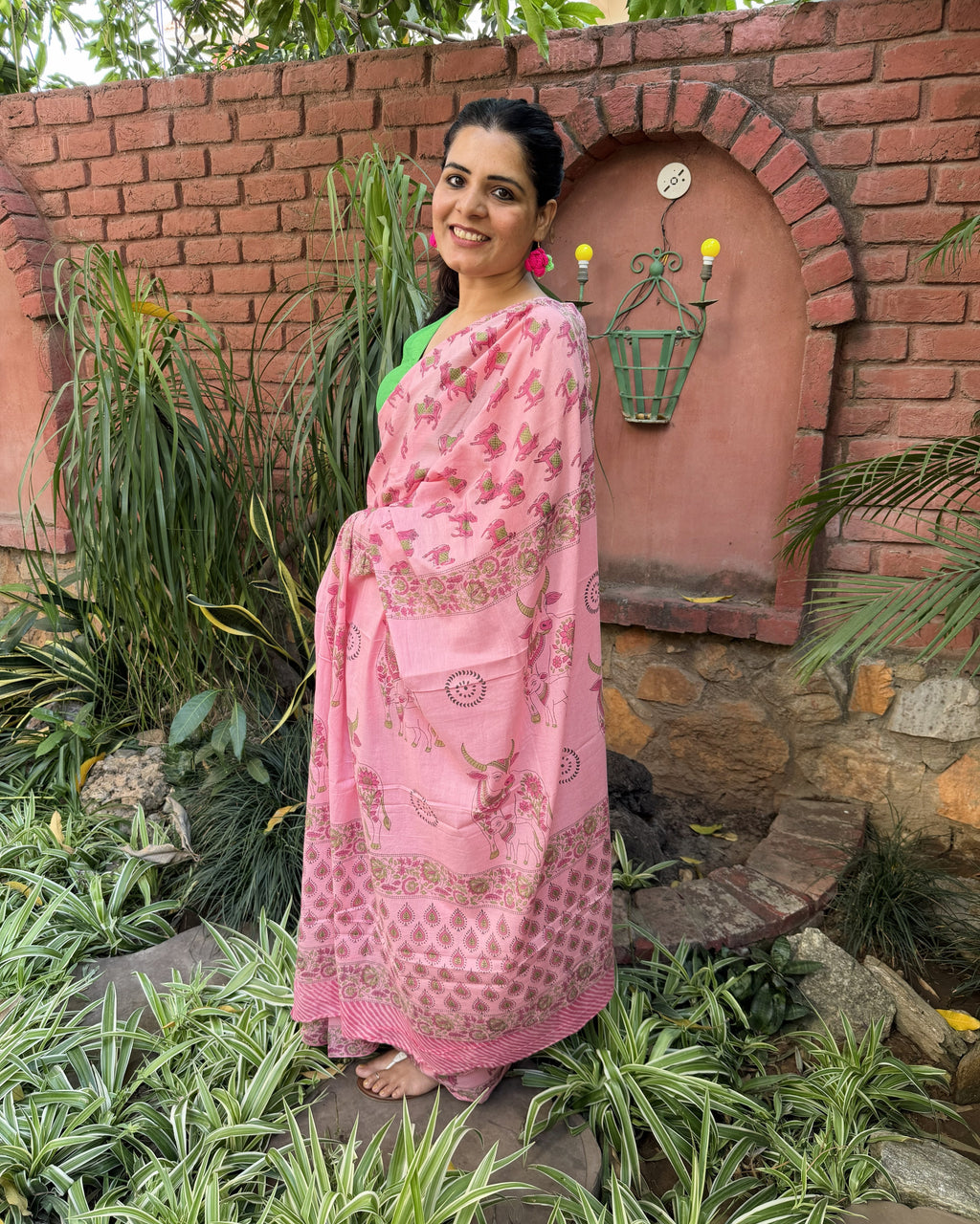 side angle pink cow print saree flow