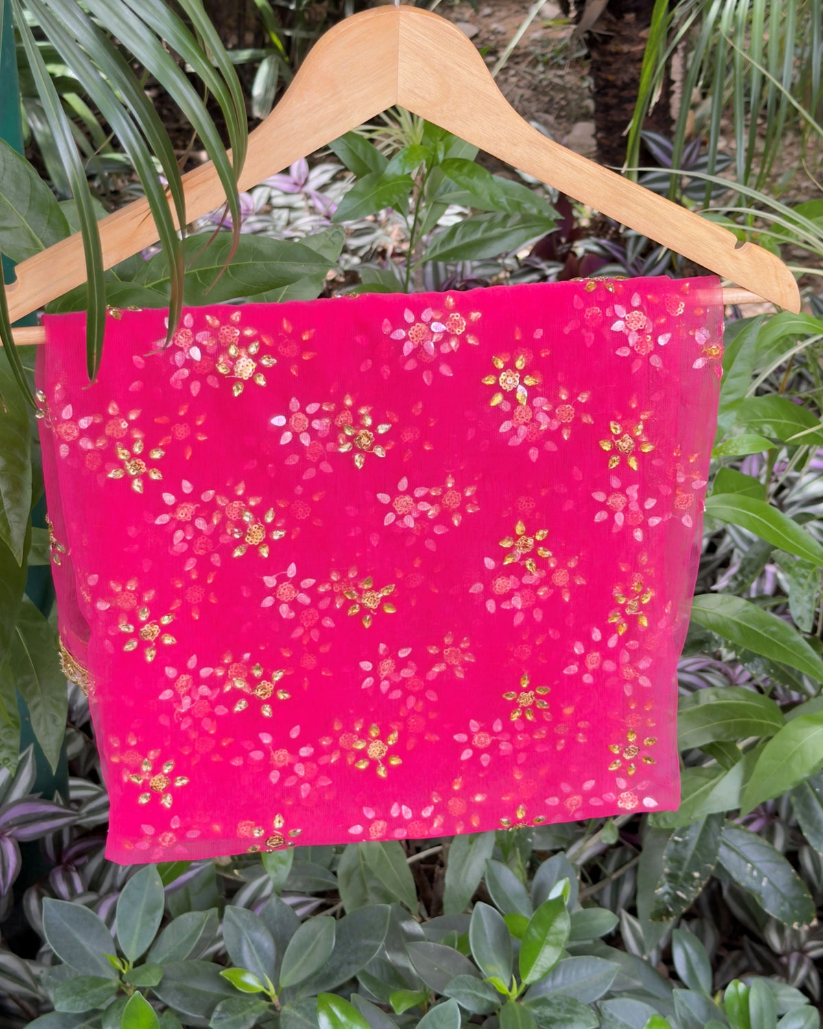 Pink net dupatta with golden floral handcrafted embellishments
