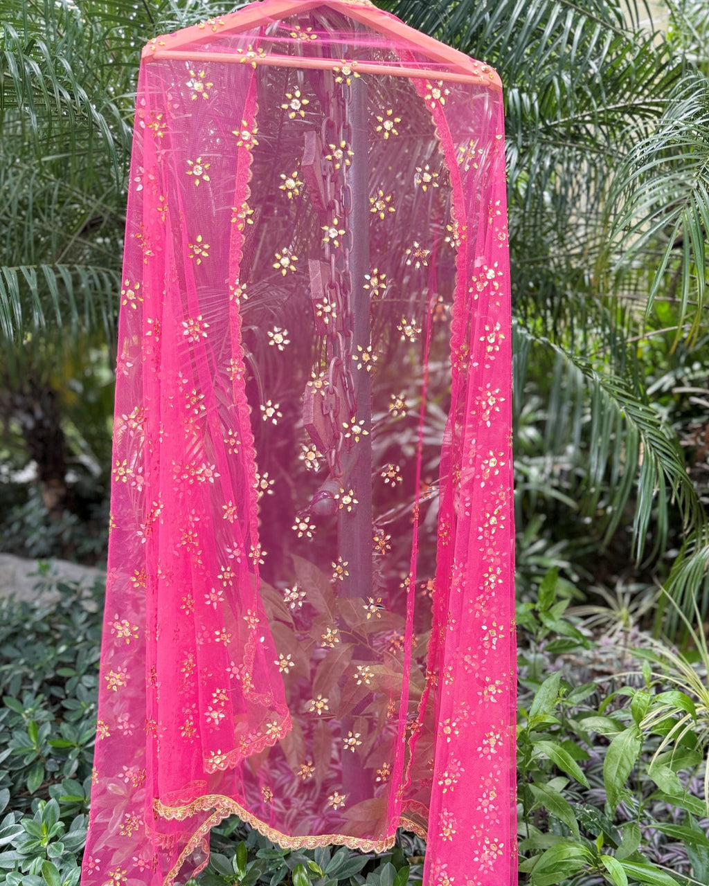 Pink sheer net dupatta with golden decorative border