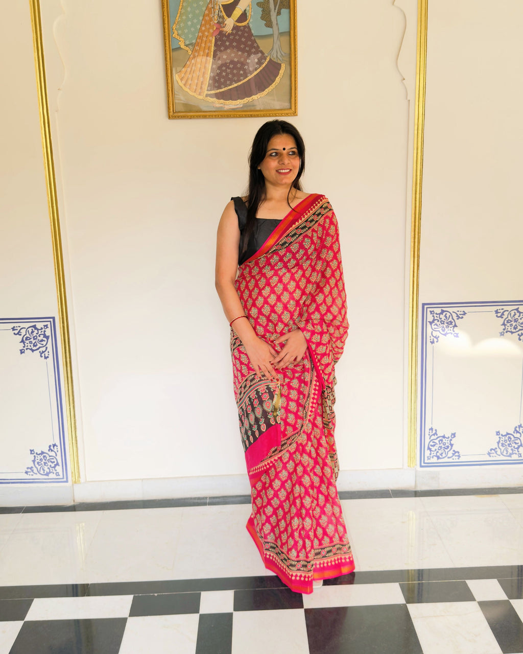 Golden zari stripe on pink cotton saree border with triangle and dot print