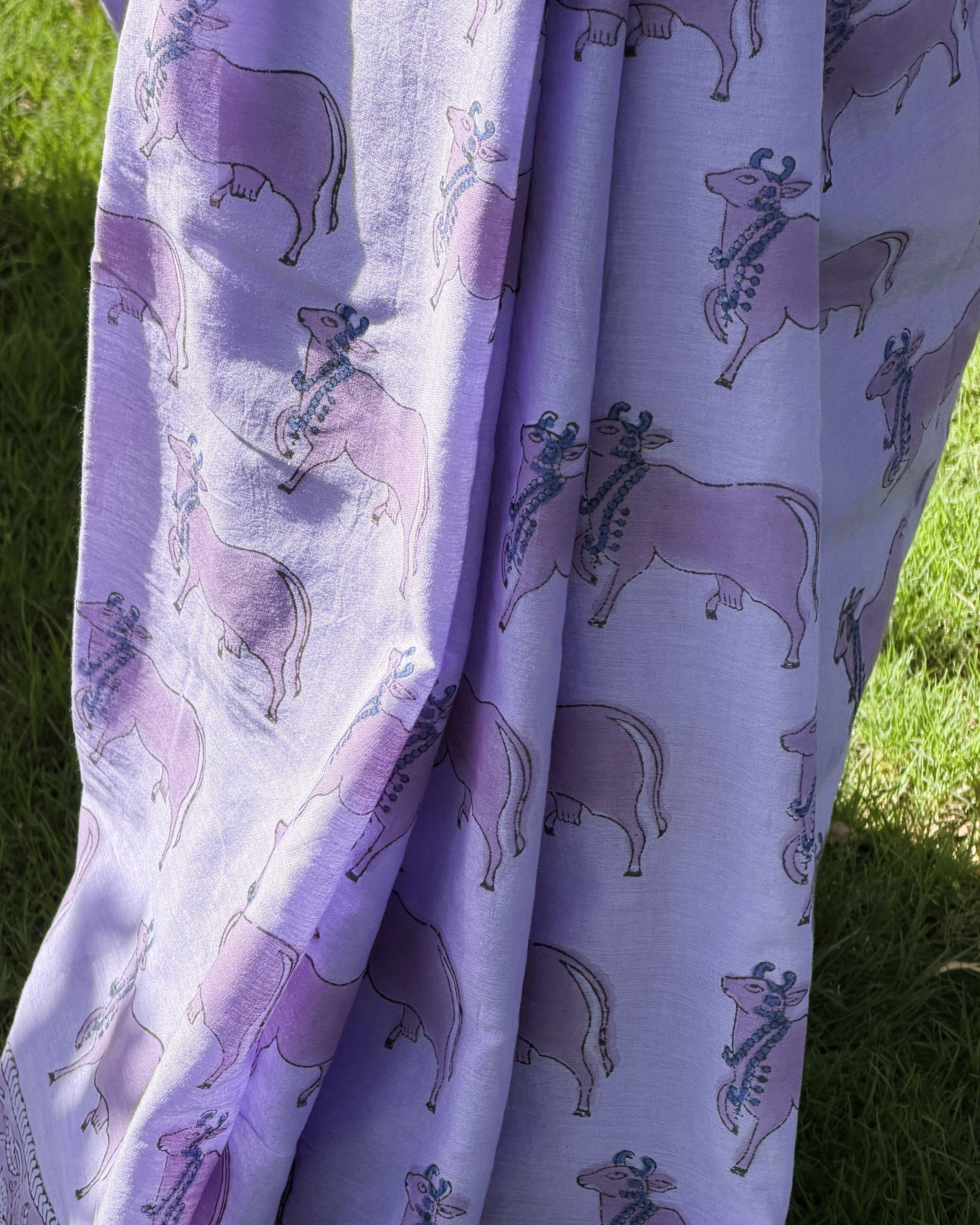 close up cow print design purple mul cotton saree