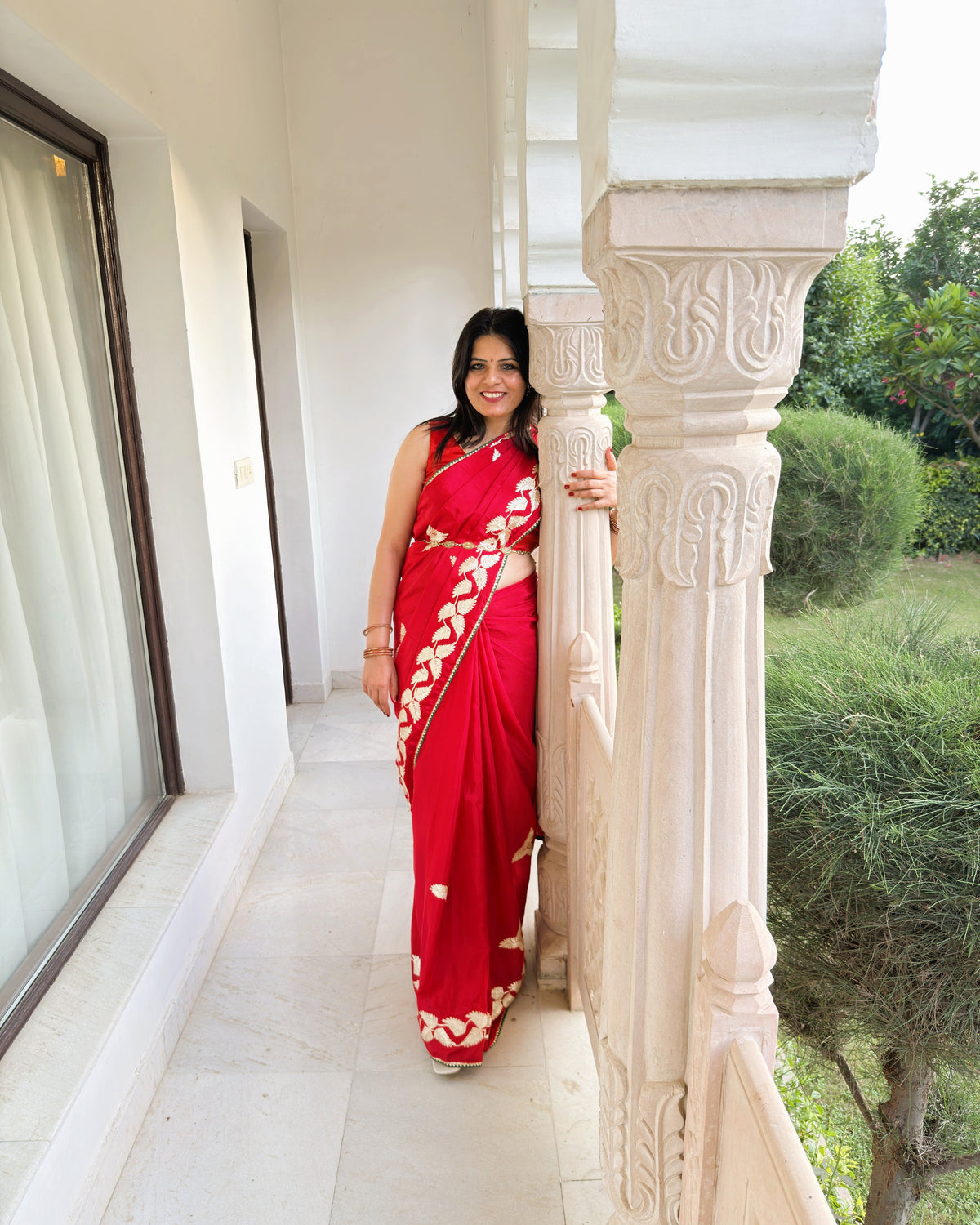 Elegant red Chinnon Silk Gotta Patti saree for special occasions