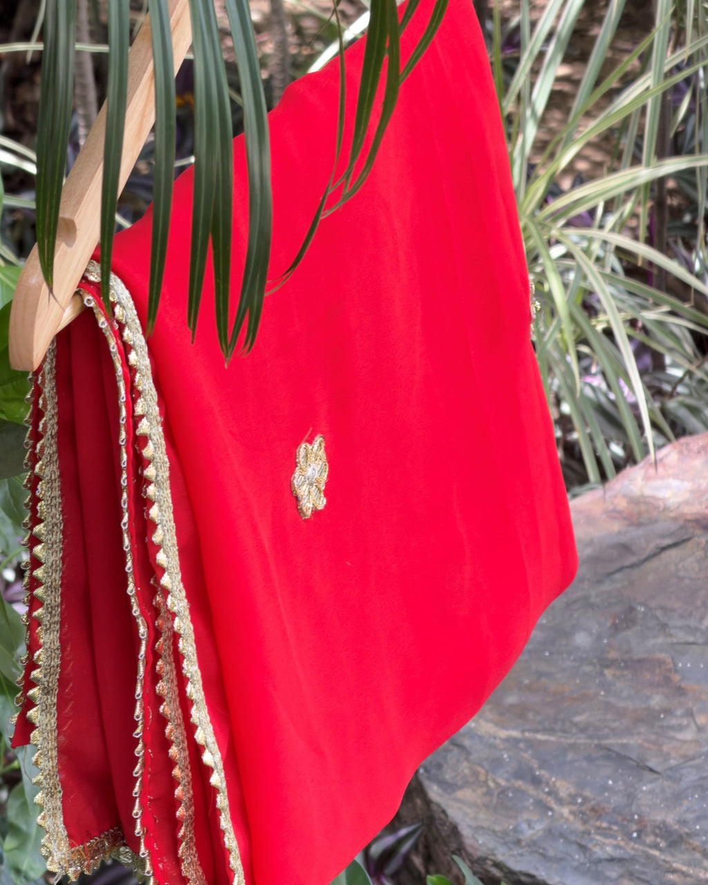 Red georgette dupatta with floral embellishments and gold border
