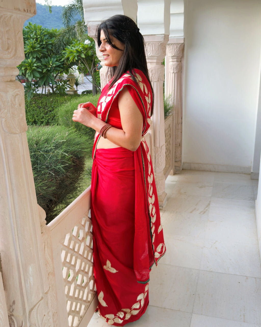 Red Chinnon Silk saree with embellished Gotta Patti border