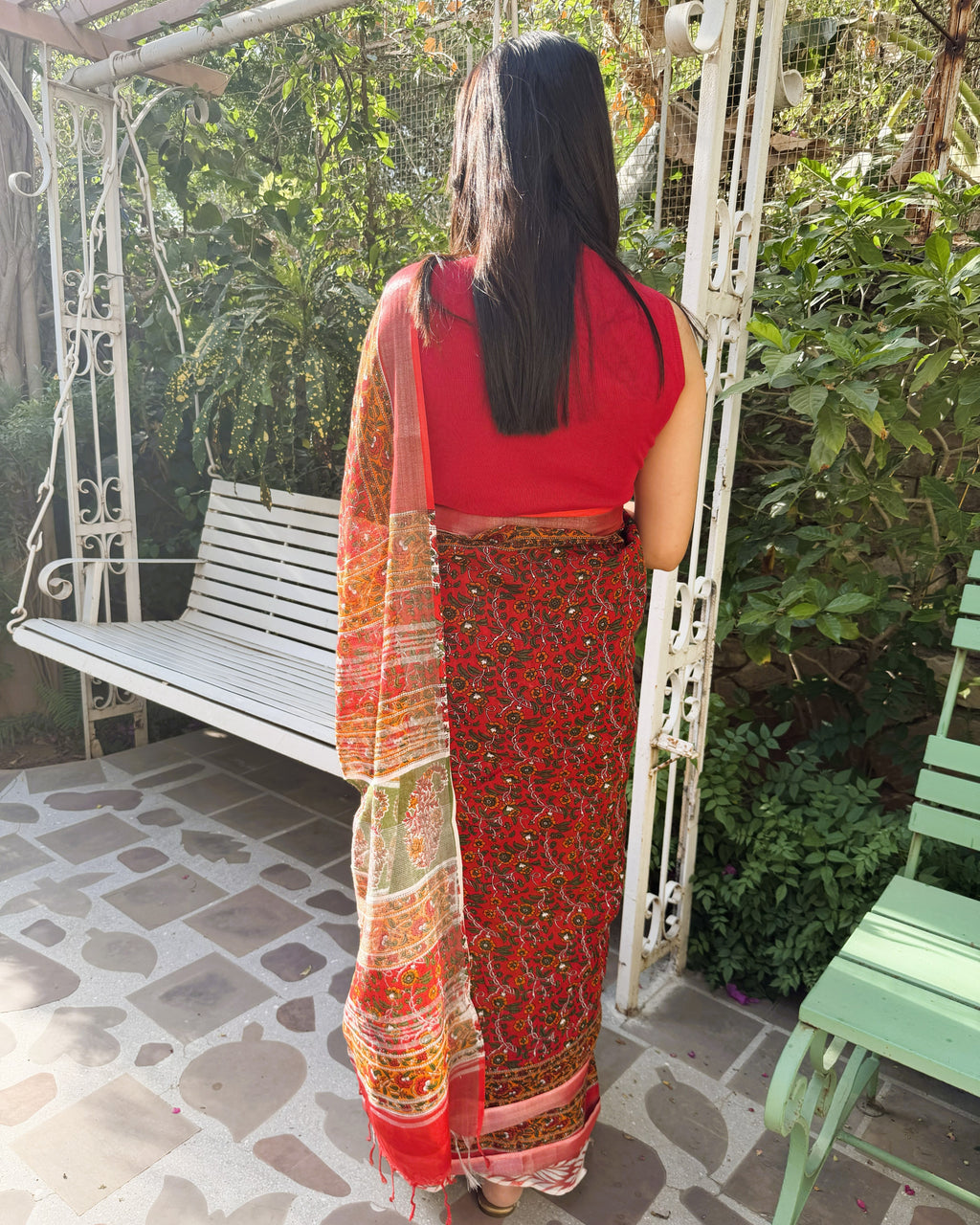 rear drape red floral linen saree