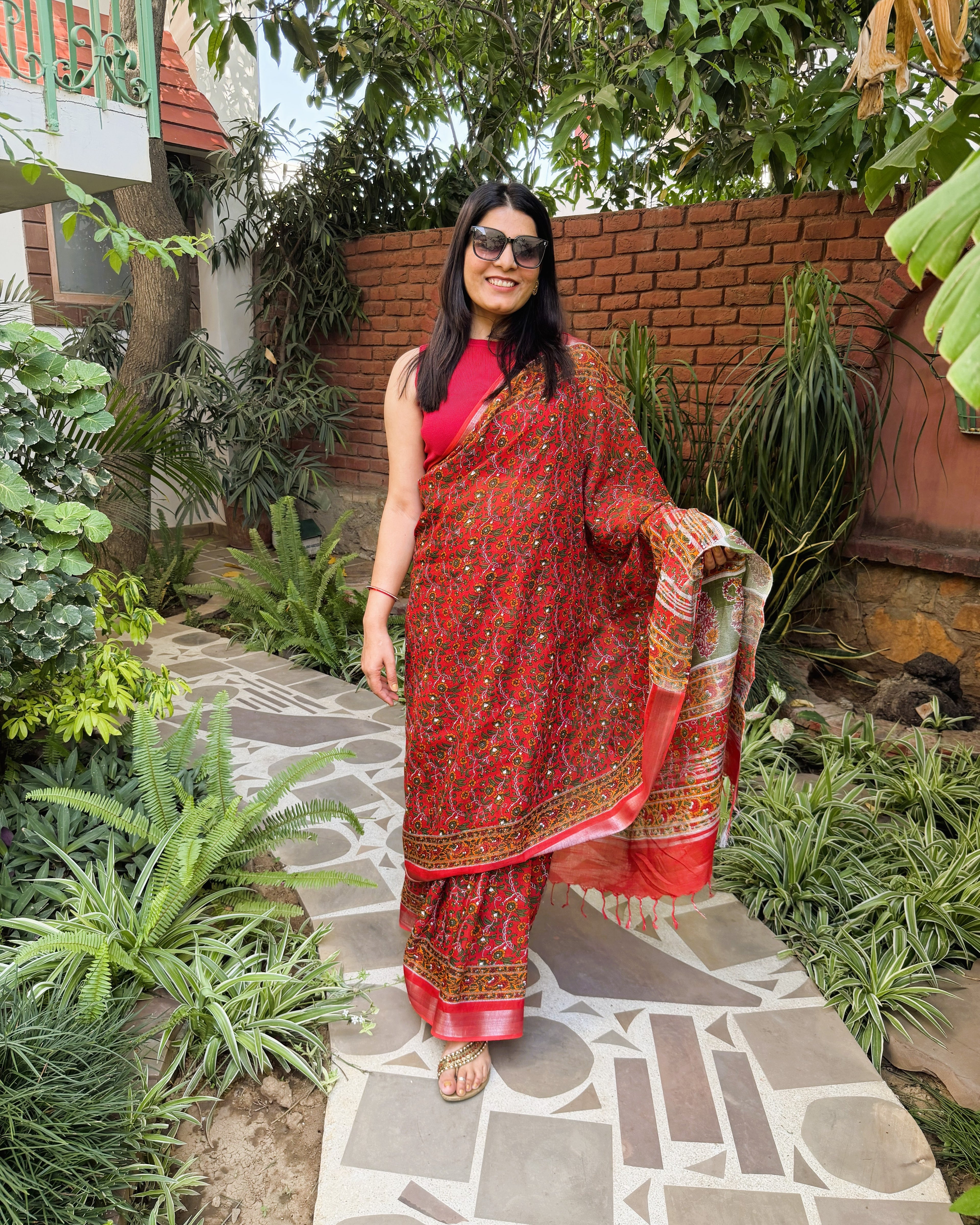 red sanganeri print linen saree front angle