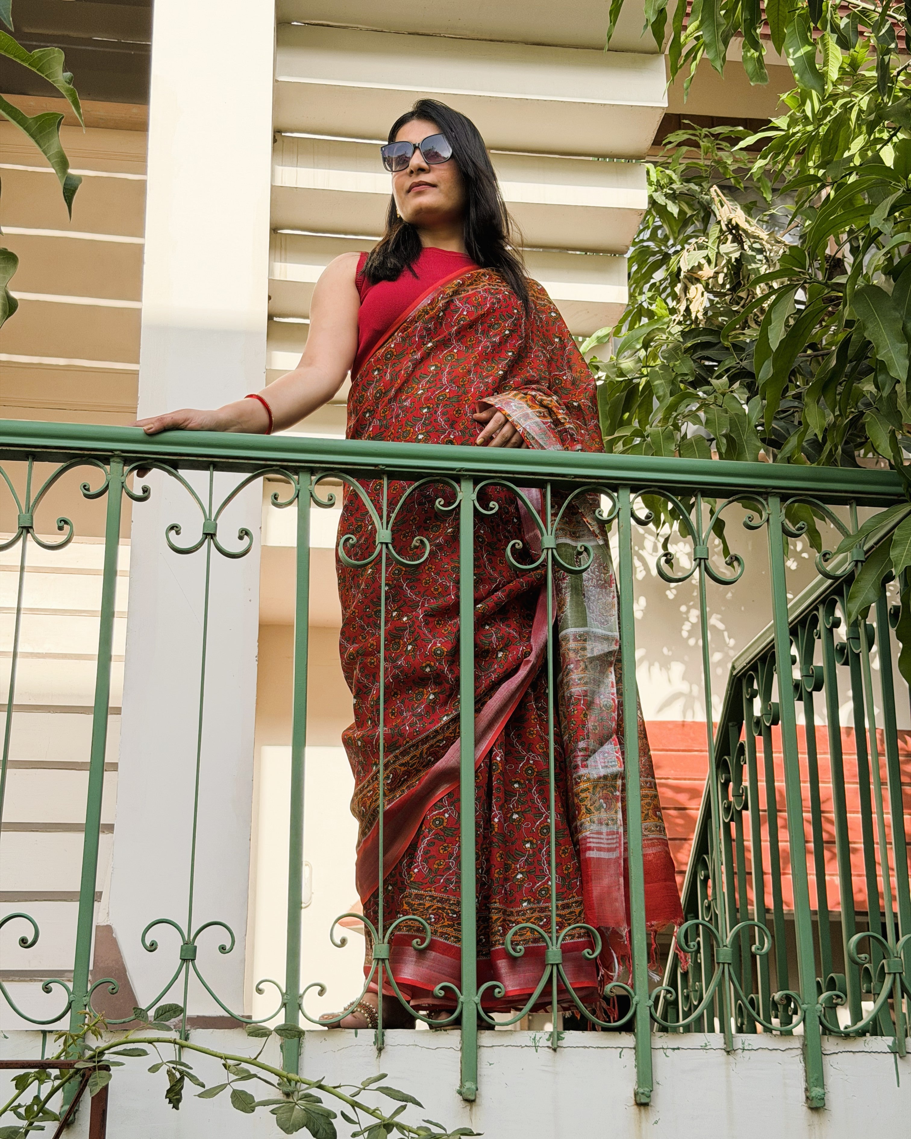 side view red linen saree sanganeri print drape