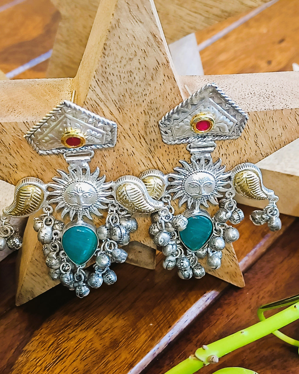 Traditional Surya Kiran brass earrings with tribal-inspired design