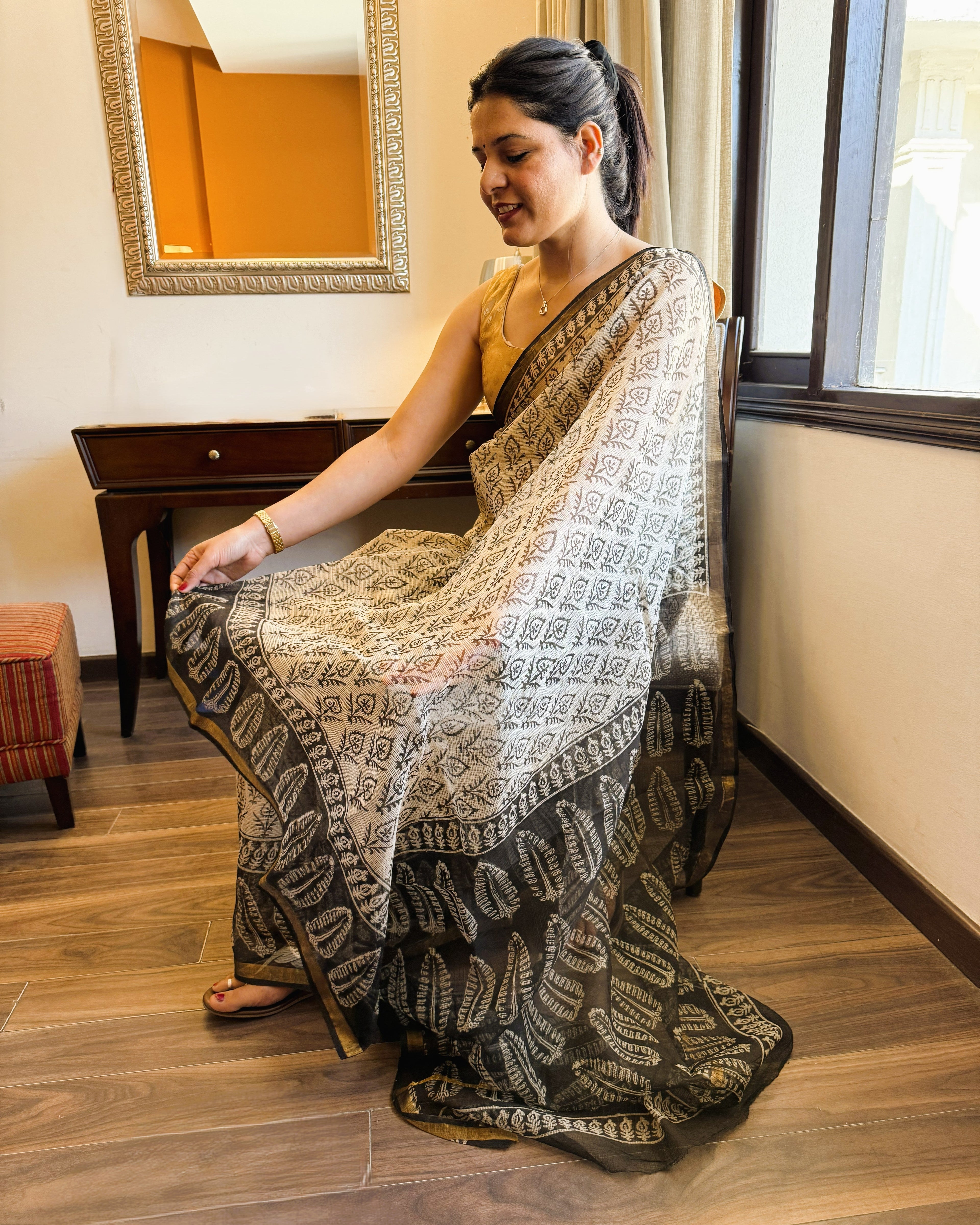 Versalia beige Kota Doria saree side drape view