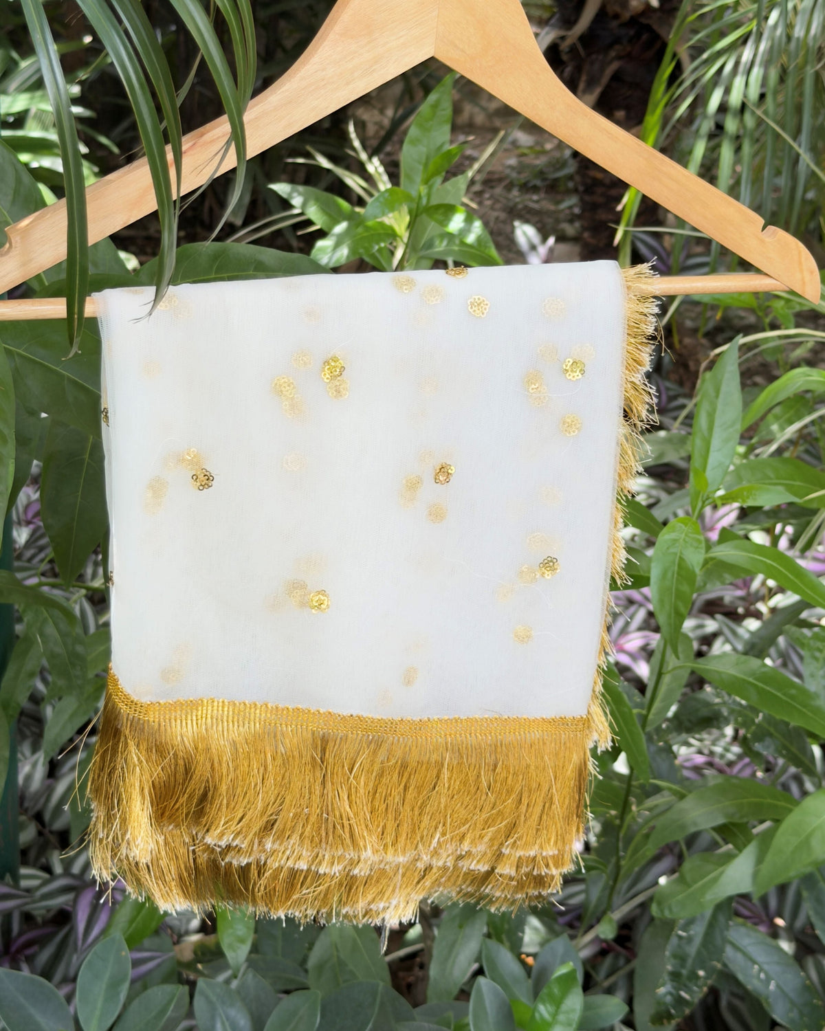 White golden net dupatta with scattered floral motifs and tassel border