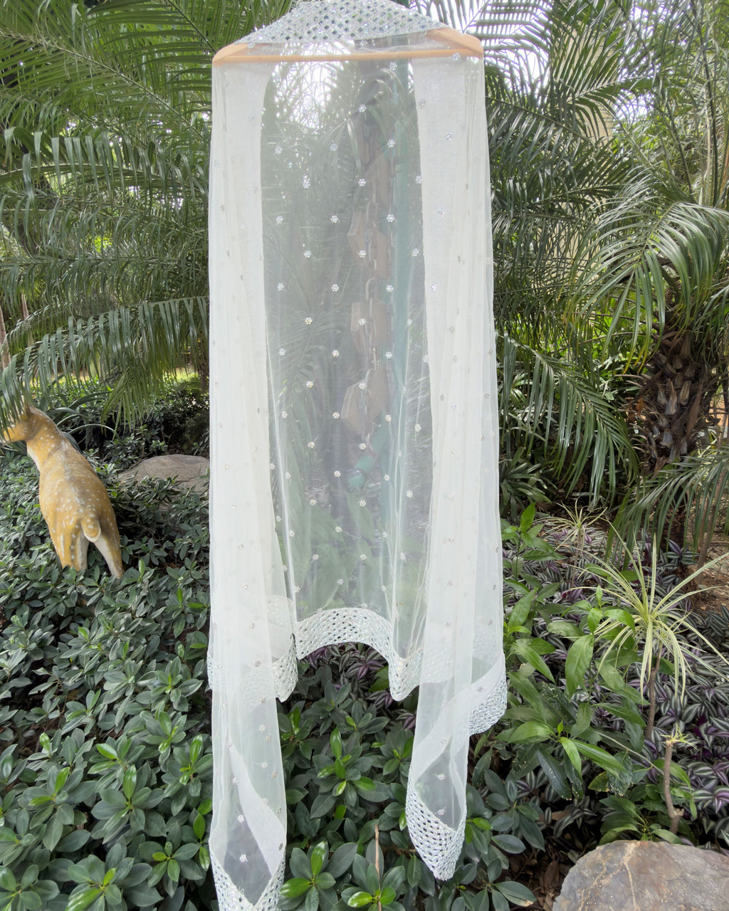 Sheer white silver net dupatta with floral motifs and mirror border