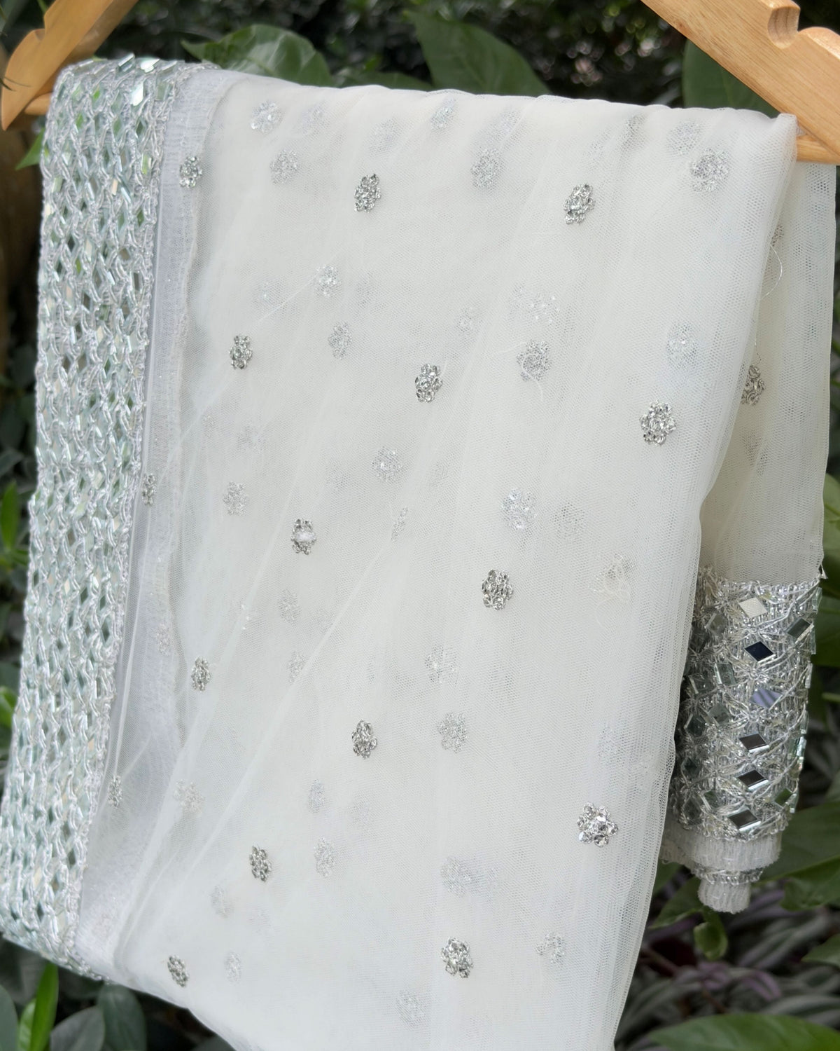 White and silver net dupatta with handcrafted mirror work border