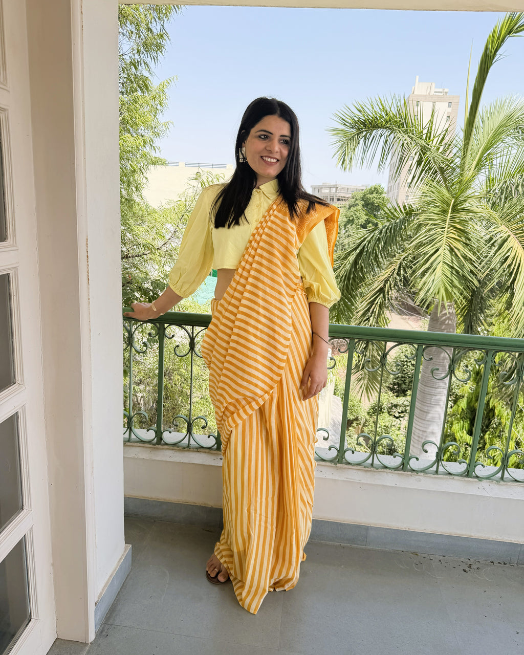 side view yellow mul cotton saree striped drape