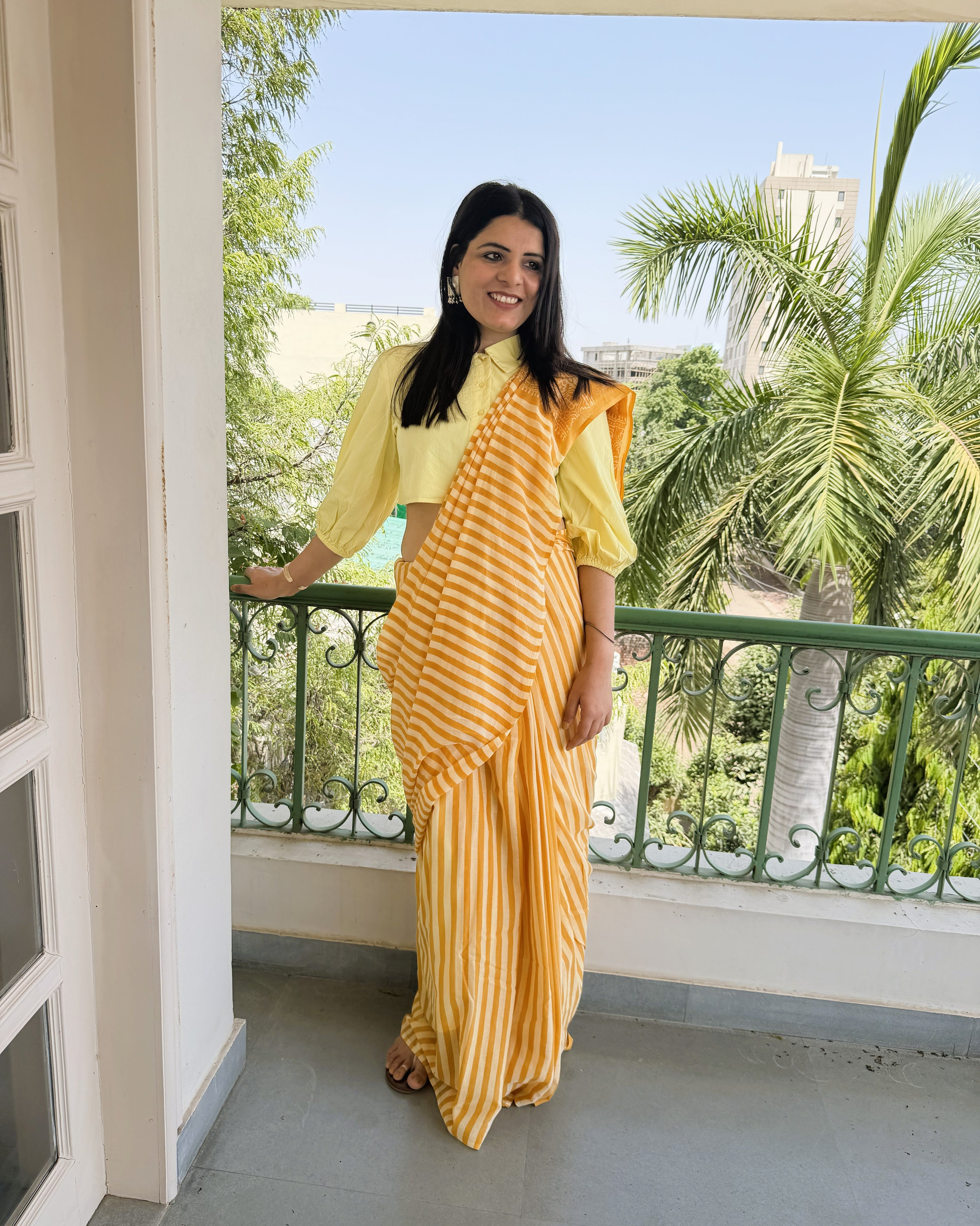 side view yellow mul cotton saree striped drape