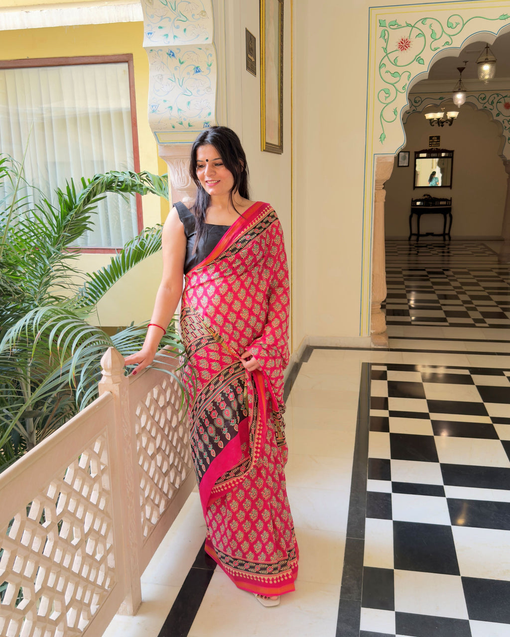 Soft breathable zari cotton fabric texture in pink with leaf motif print